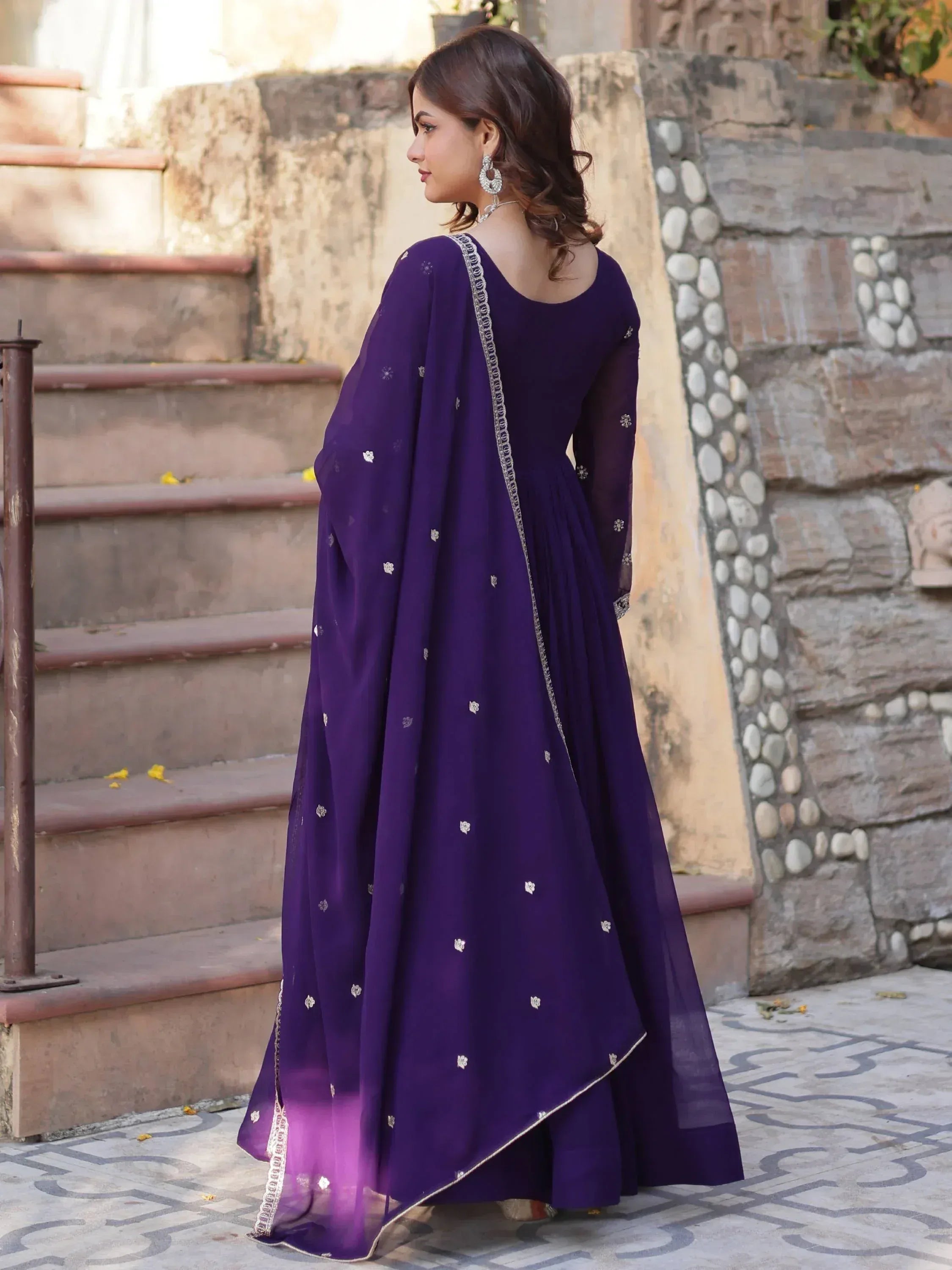 Purple ethnic anarkali gown with silver embroidery, perfect for Indian occasions and festive wear.
