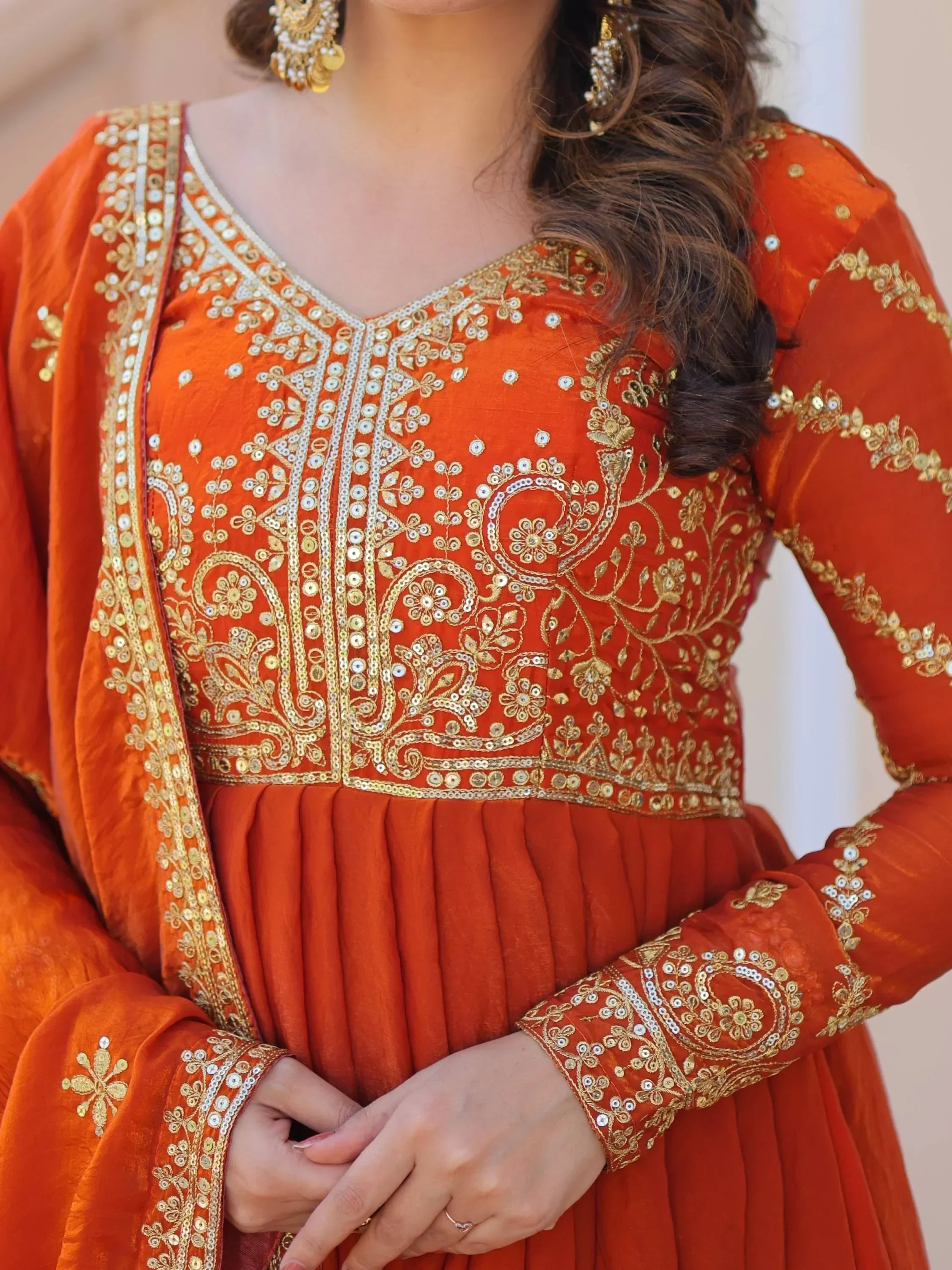 Orange ethnic dress with gold embroidery, V-neck, long sleeves, traditional Indian gown