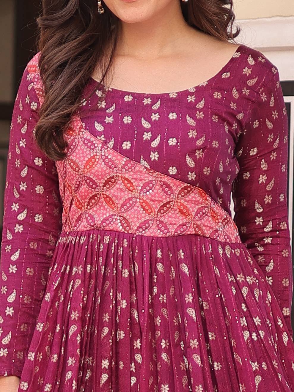 Elegant maroon ethnic gown with floral print and pleated skirt, perfect for Indian occasions