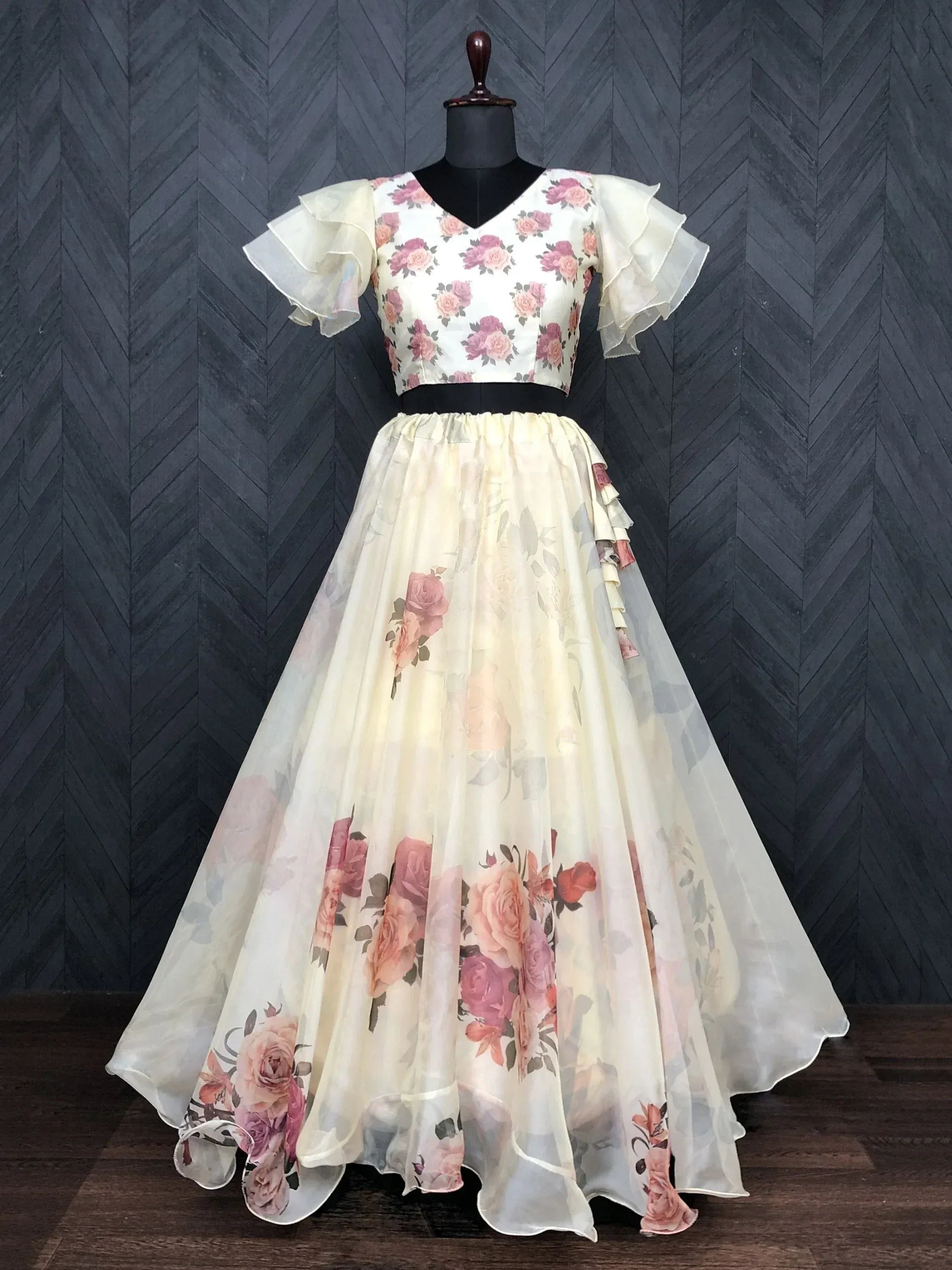 Floral print ethnic gown with ruffled sleeves and layered skirt, perfect for Indian occasions