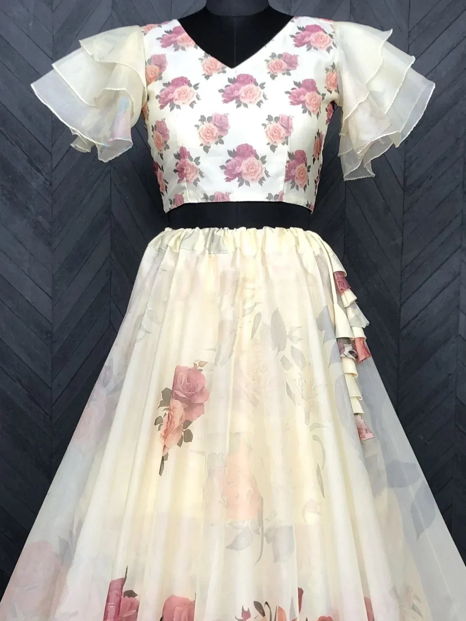 Floral print ethnic gown with ruffled sleeves and layered skirt, perfect for Indian occasions