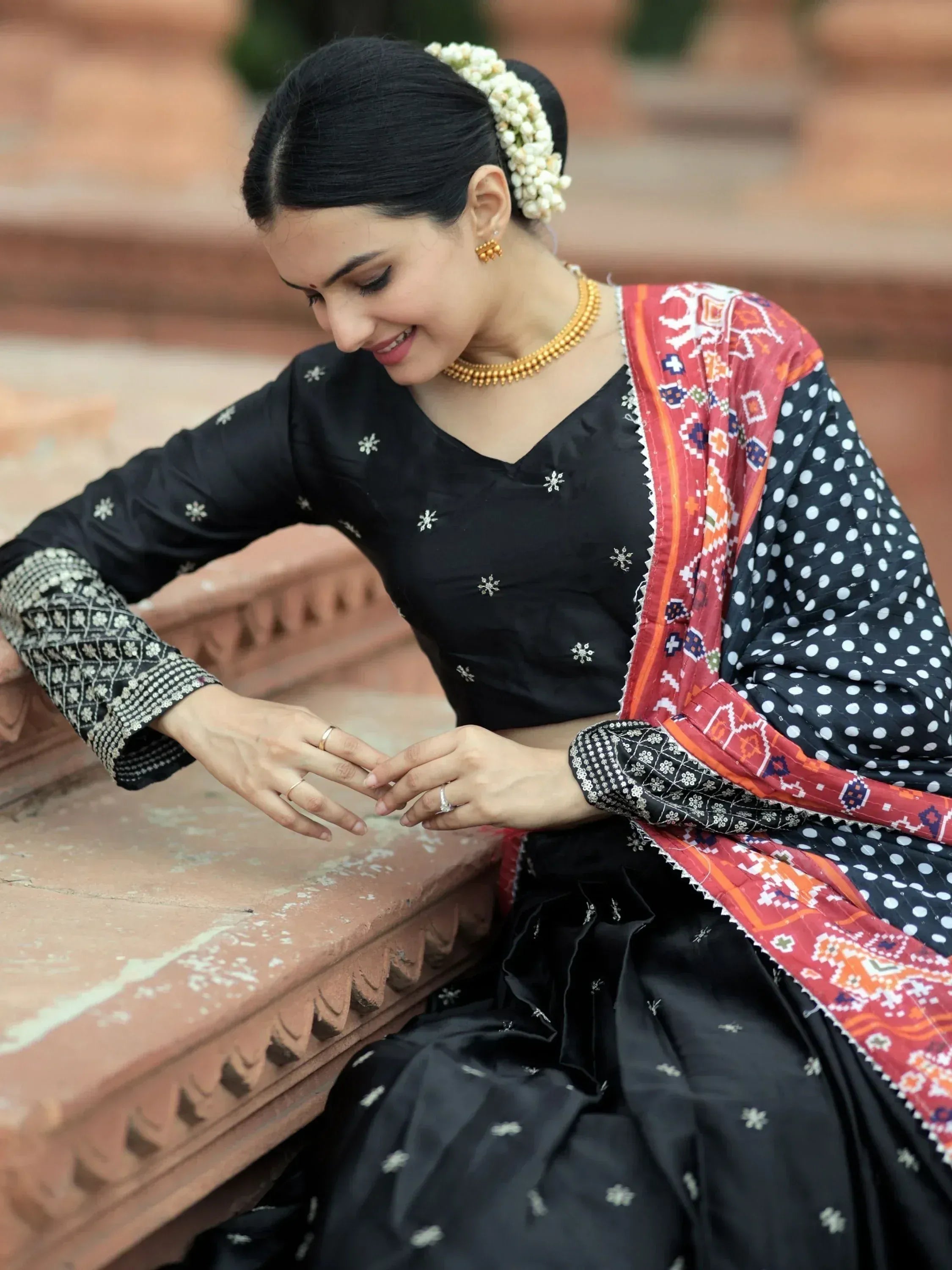 Black embroidered salwar kameez with polka dot dupatta, traditional Indian ethnic wear for women