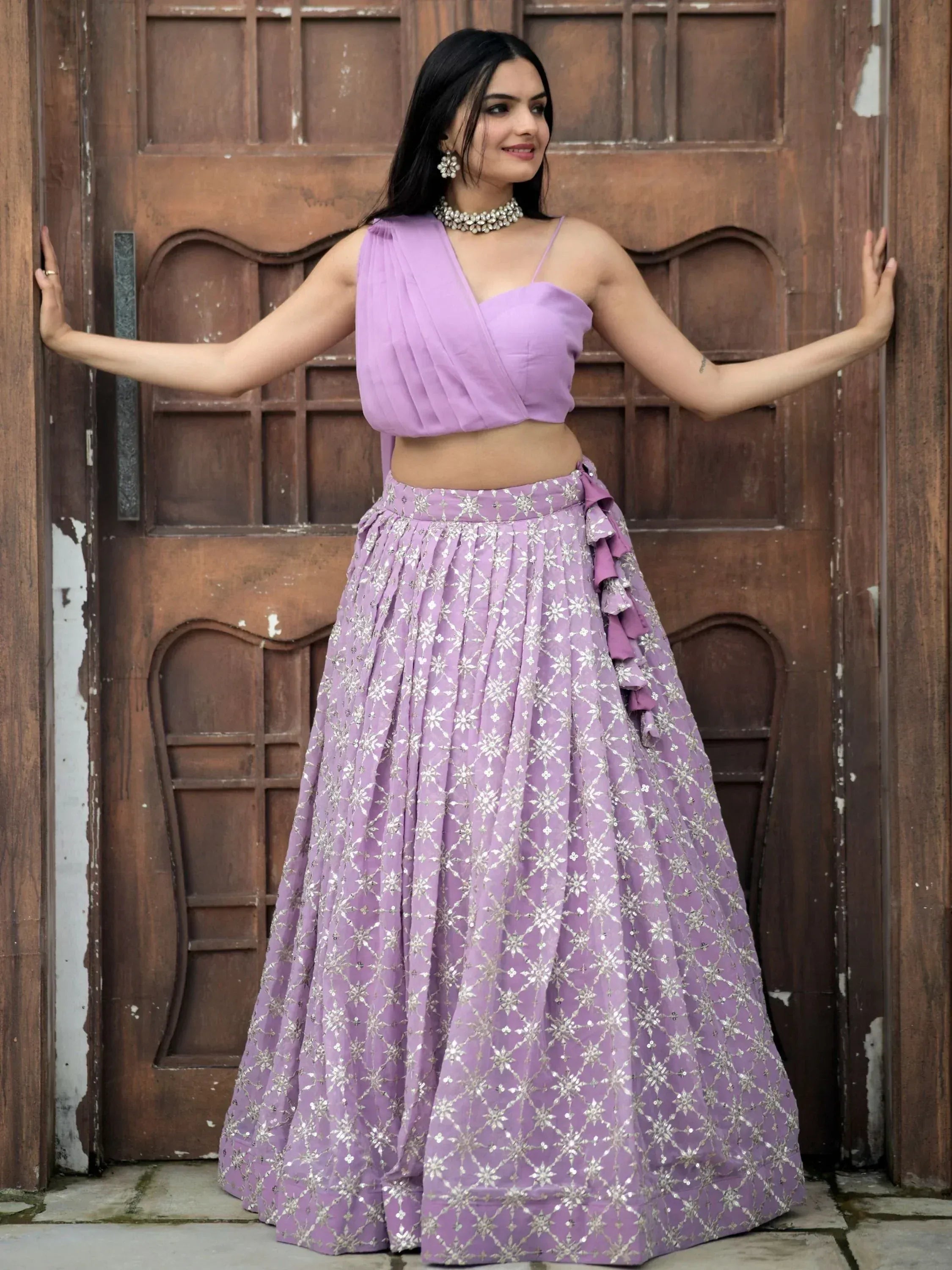 Lavender lehenga choli with silver embroidery, ruffle detail, and crop top for Indian ethnic wear