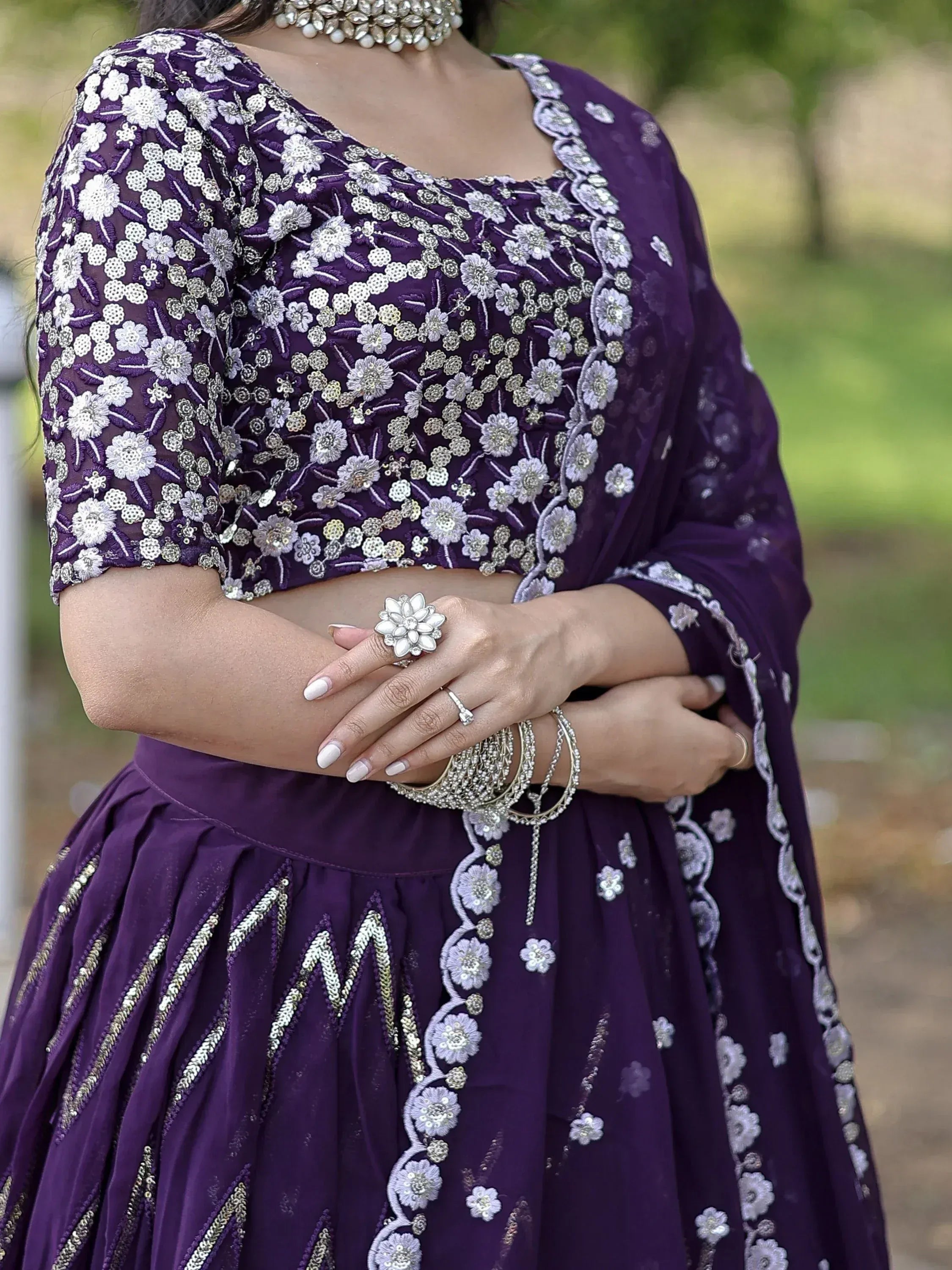 Purple embroidered lehenga choli with floral zari work, perfect for Indian ethnic occasions