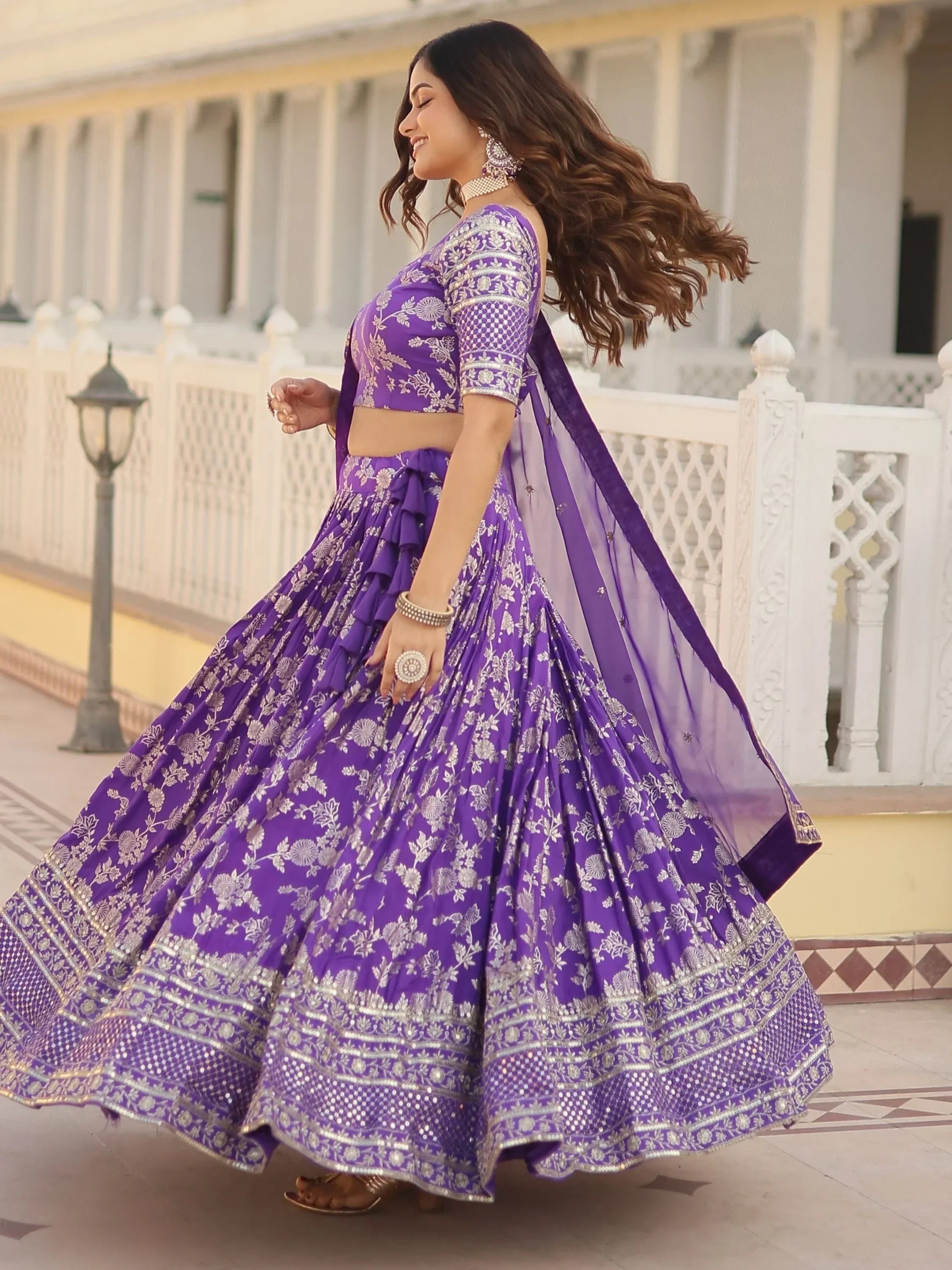 Purple floral lehenga choli with silver embroidery, perfect for Indian ethnic wear and festive occasions.