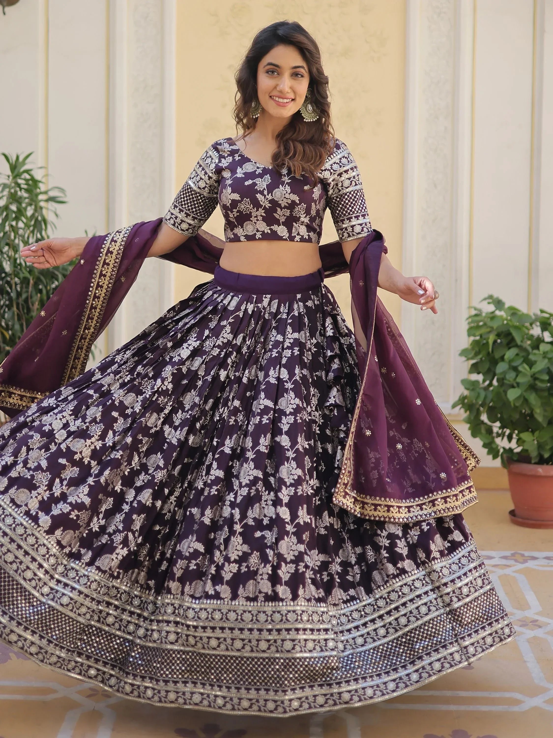 Purple floral lehenga choli with gold embroidery, perfect for Indian ethnic wear and festive occasions.