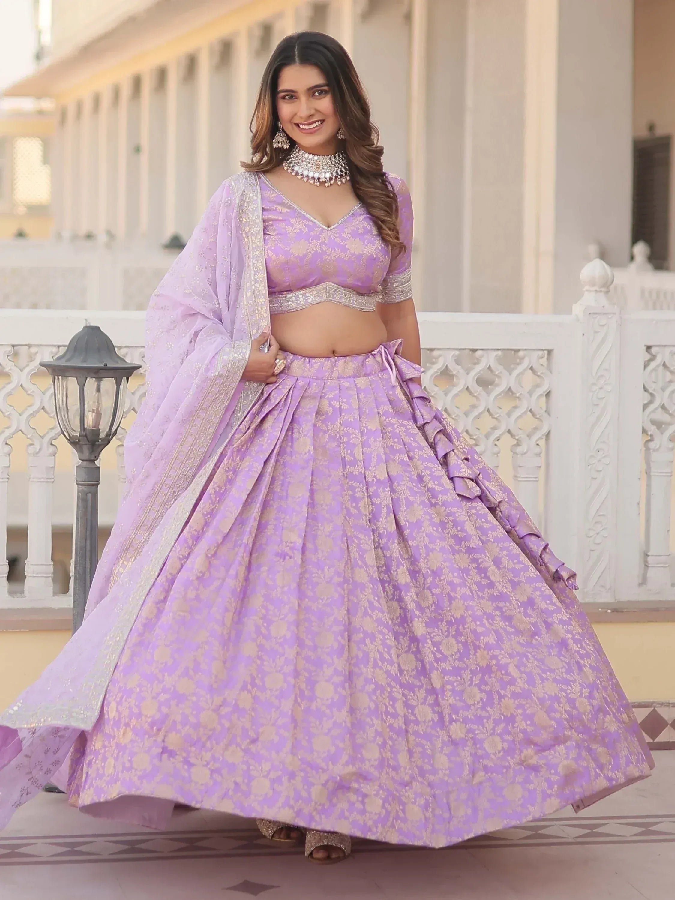 Lavender designer lehenga choli with gold floral print, perfect for Indian ethnic wear events