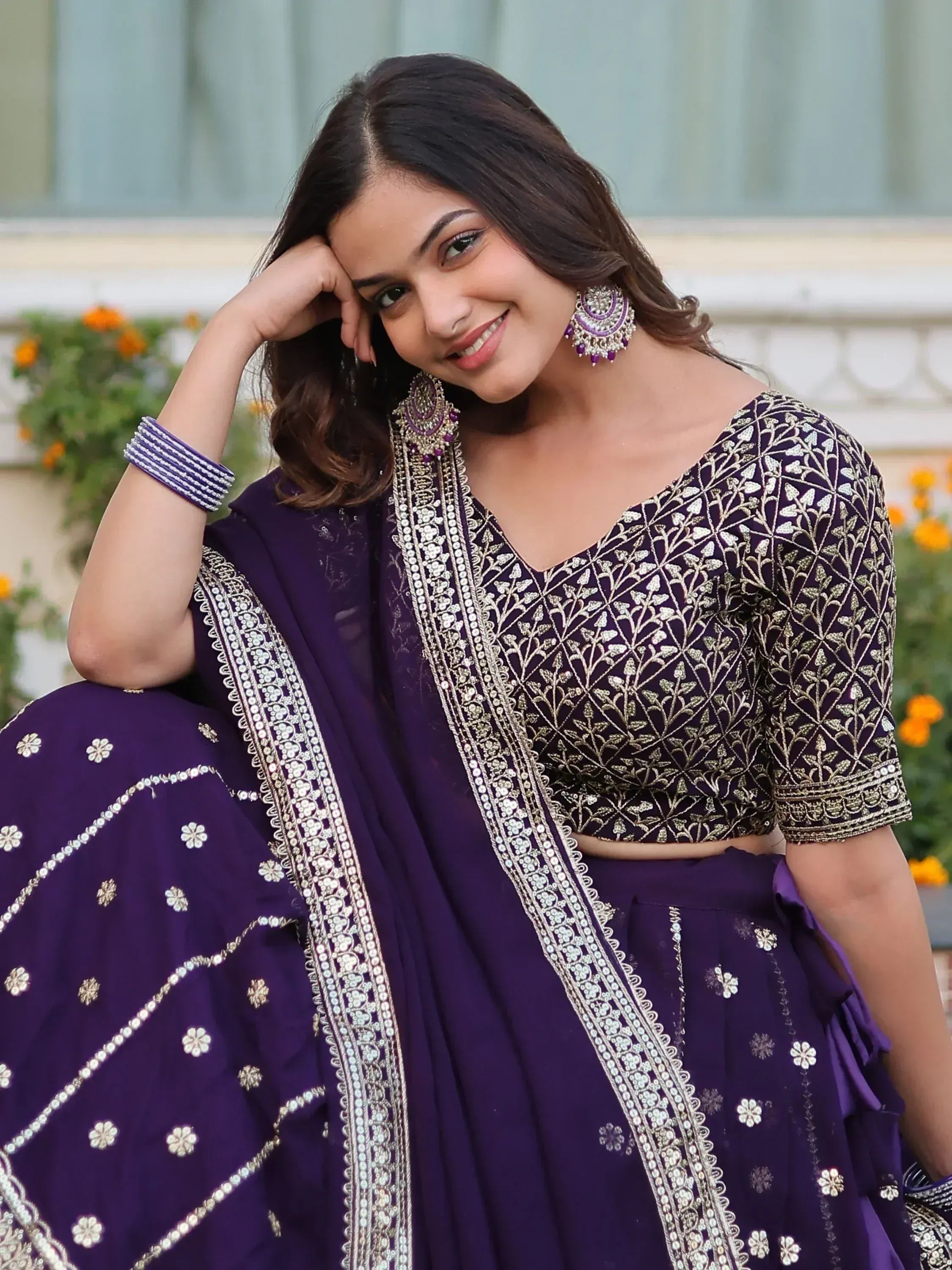 Purple embroidered lehenga choli with gold floral work, perfect for Indian ethnic wear occasions