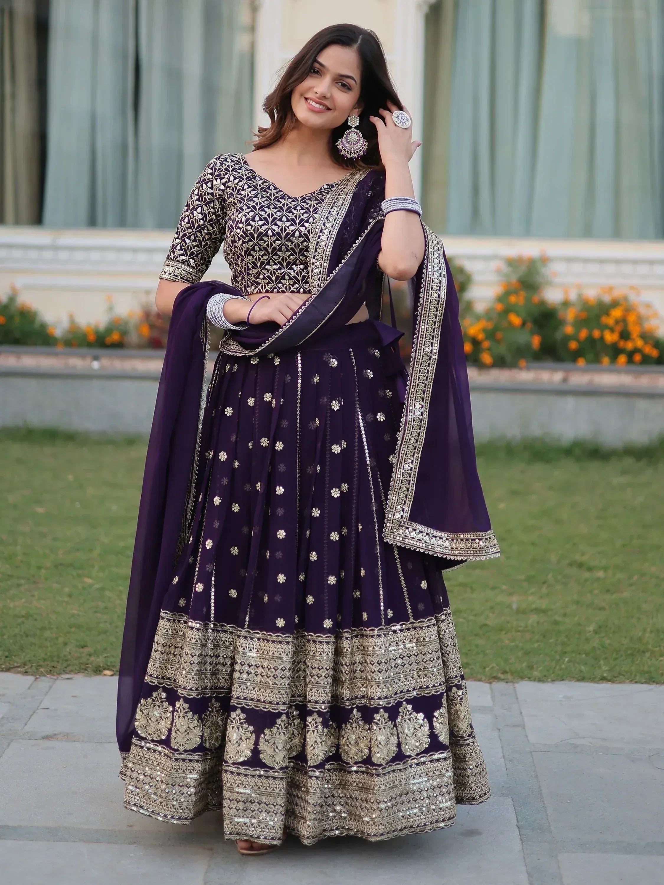 Purple designer lehenga choli with gold embroidery, perfect for Indian ethnic wear occasions