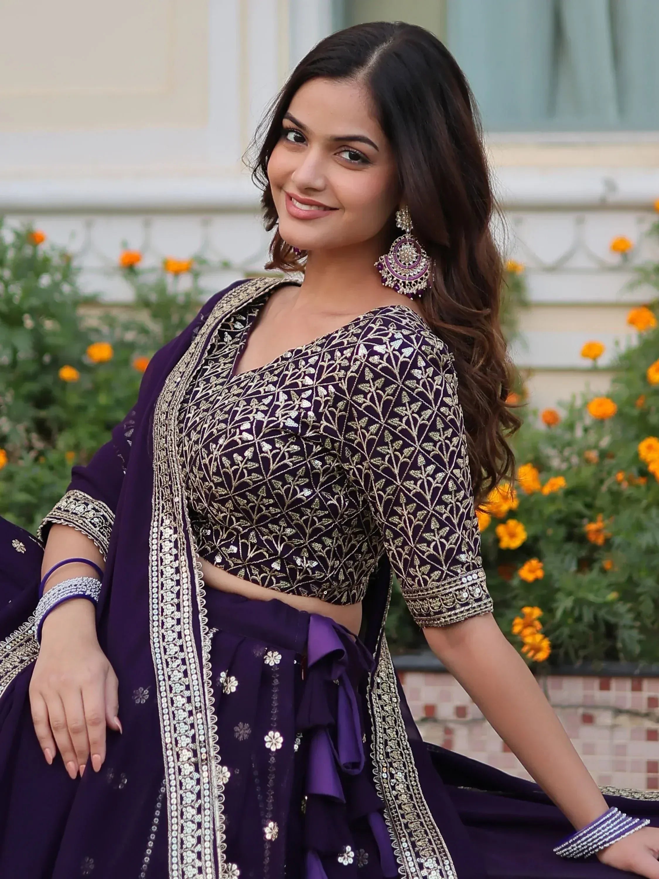 Purple embroidered lehenga choli with gold detailing, perfect for Indian ethnic wear occasions
