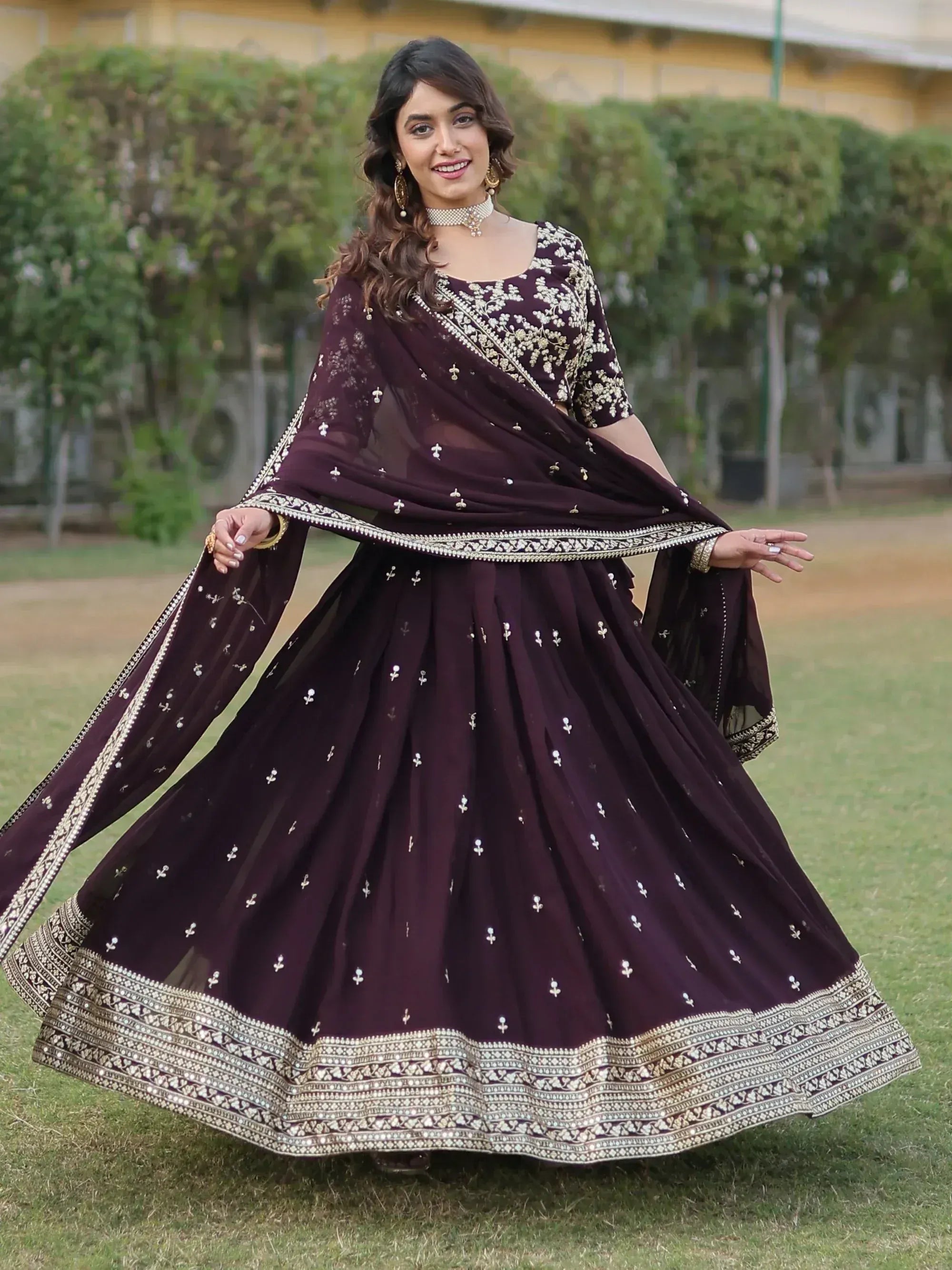 Elegant purple lehenga choli with gold embroidery, perfect for Indian ethnic wear occasions