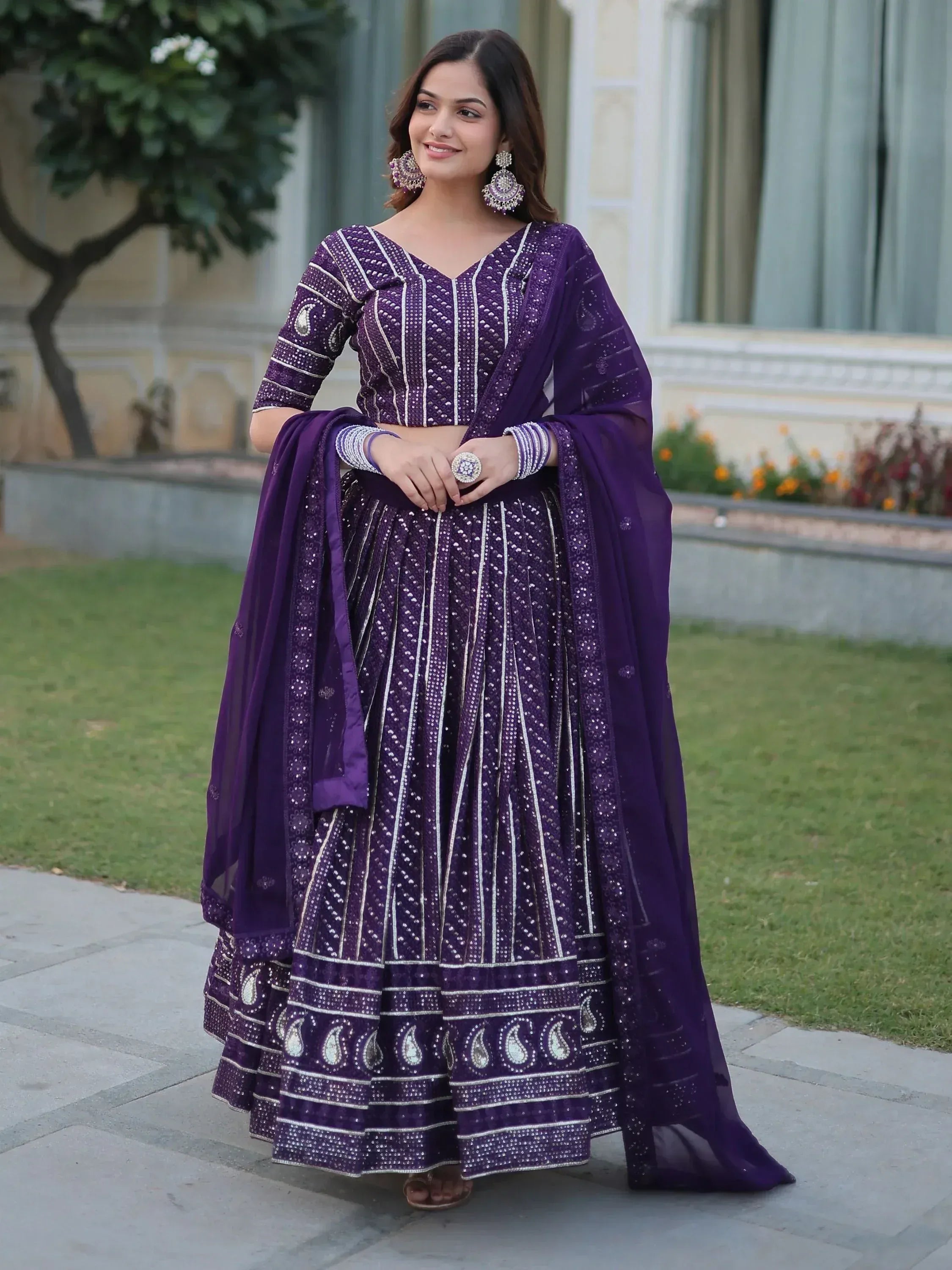 Purple designer lehenga choli with silver embroidery, perfect for Indian ethnic wear occasions