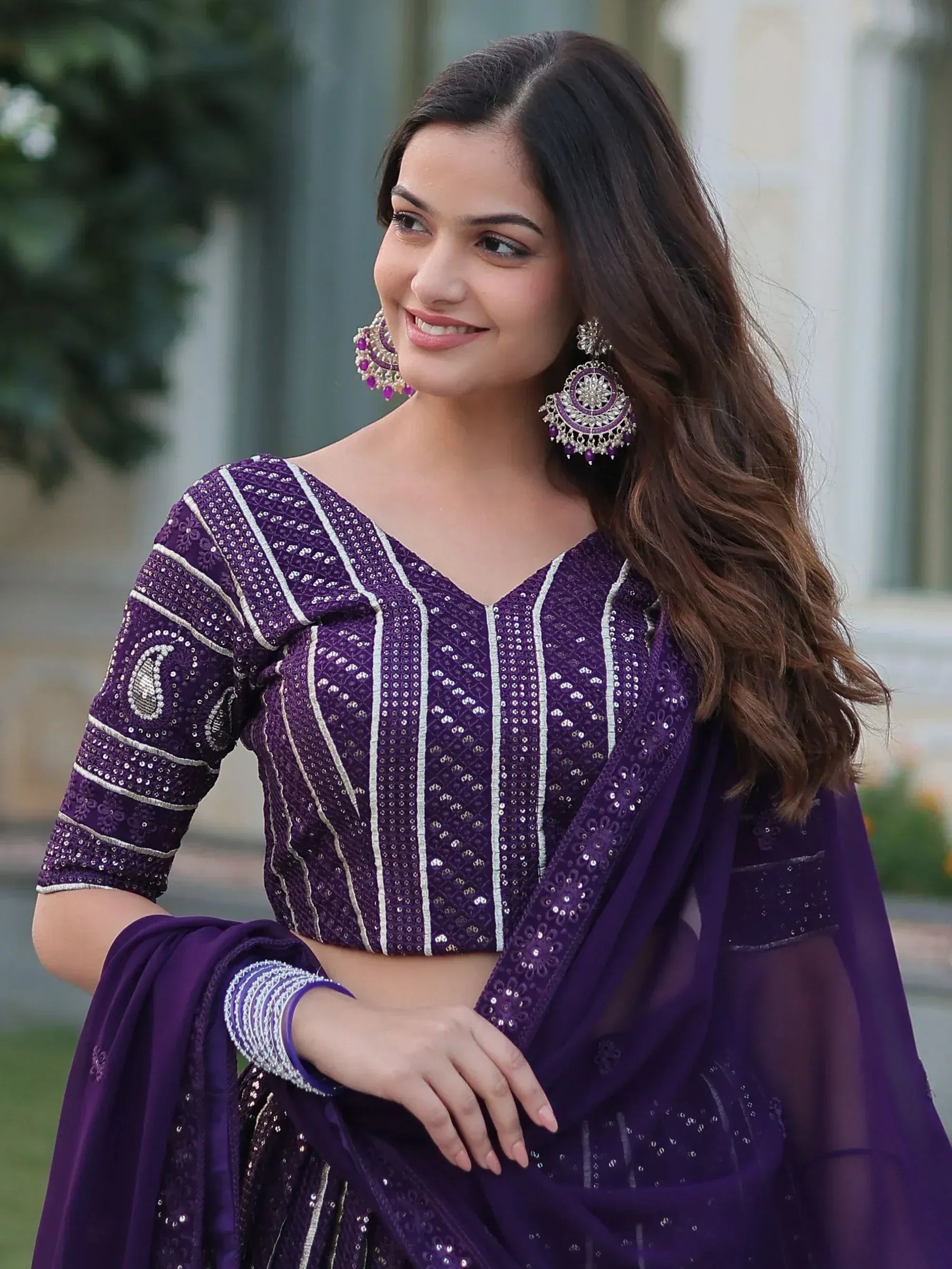 Purple embroidered lehenga choli with silver detailing, perfect for Indian ethnic wear events
