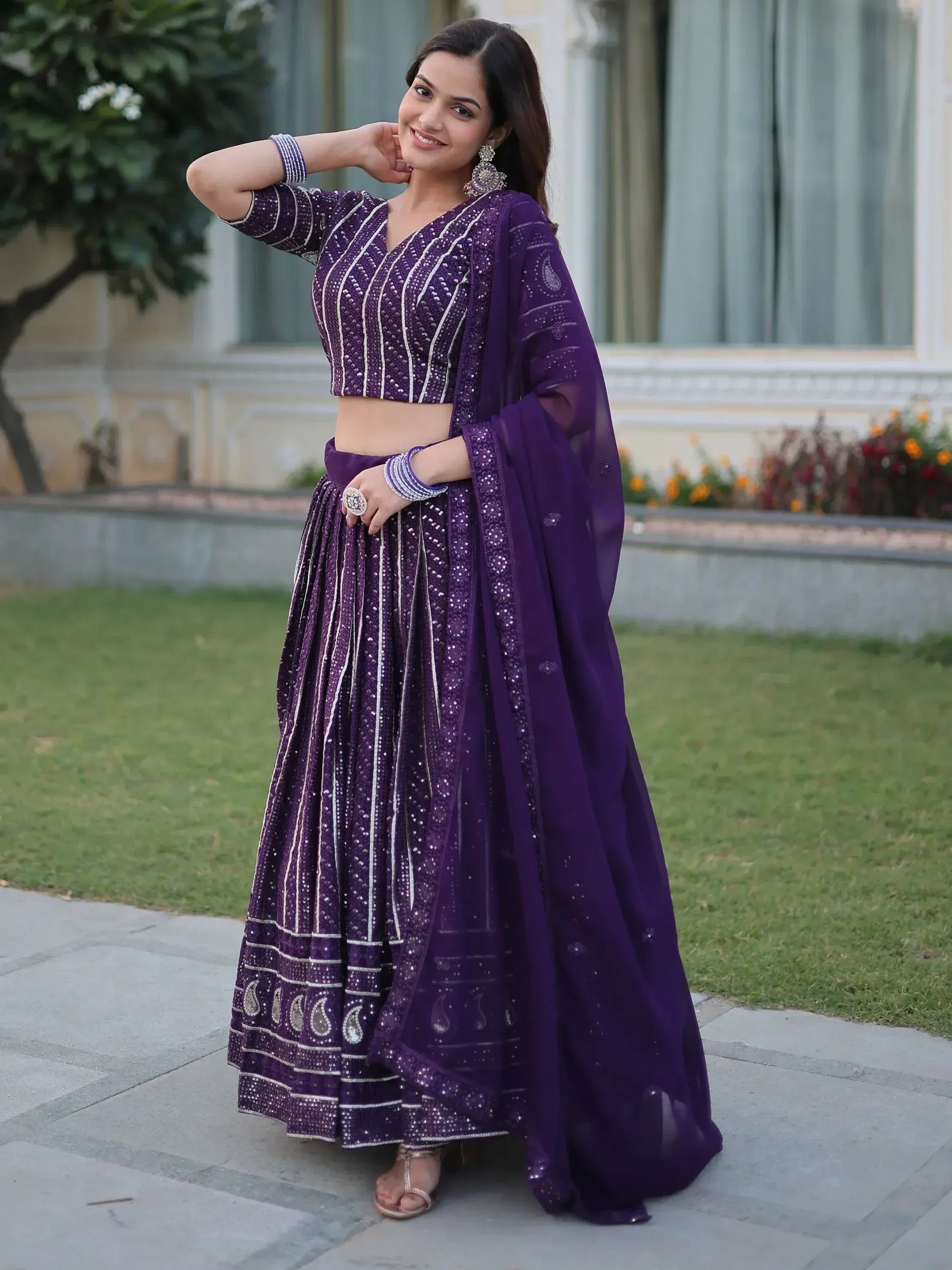 Purple embroidered lehenga choli with sequin detailing, perfect for Indian ethnic wear occasions