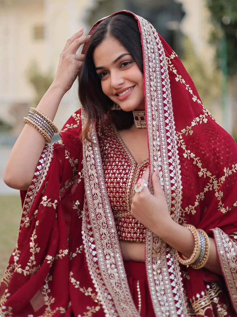 Fascinating Maroon Embroidered Georgette Wedding Wear Lehenga Choli