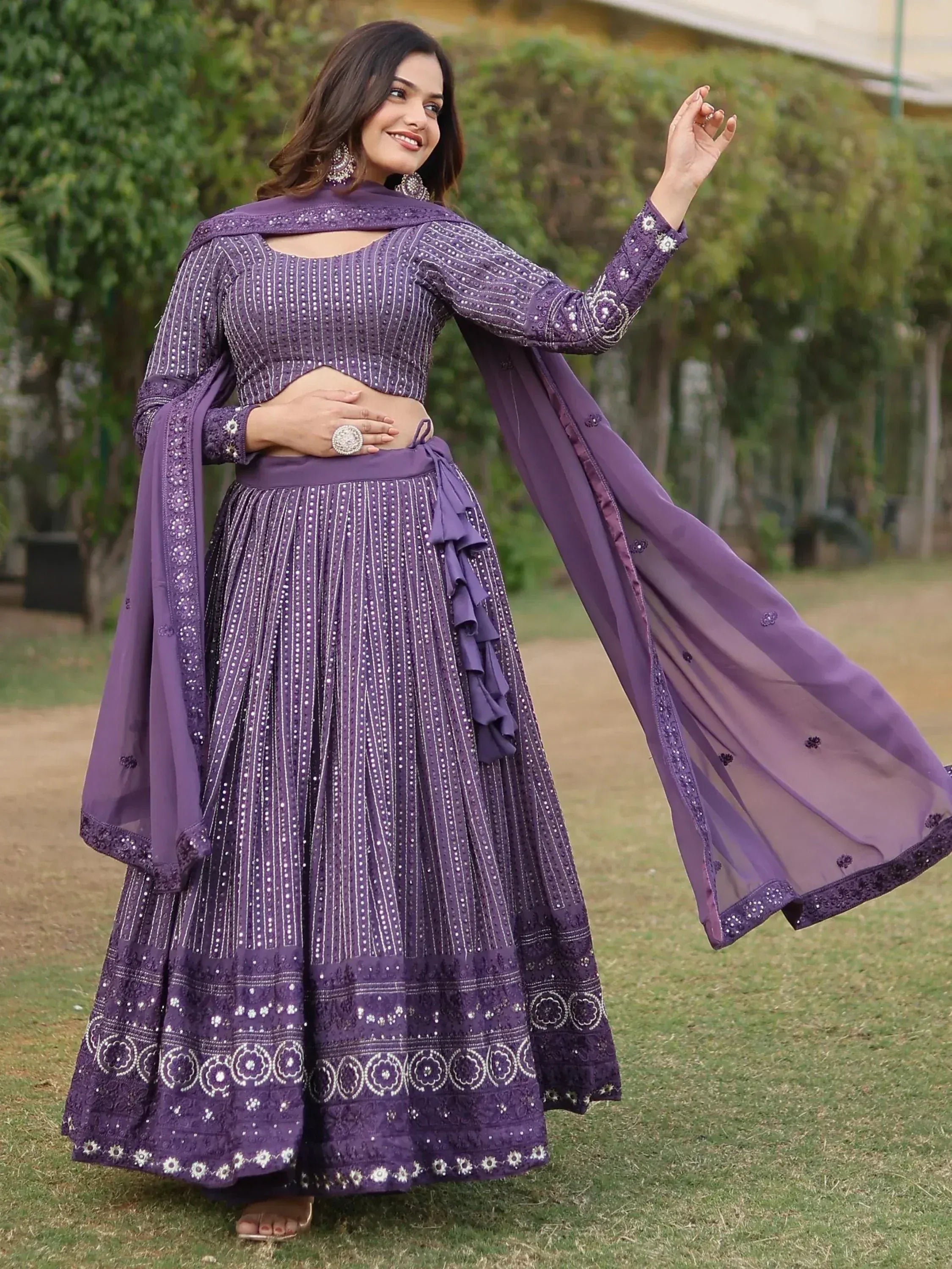 Purple embroidered lehenga choli with ruffle detailing and dupatta, perfect for Indian ethnic wear occasions