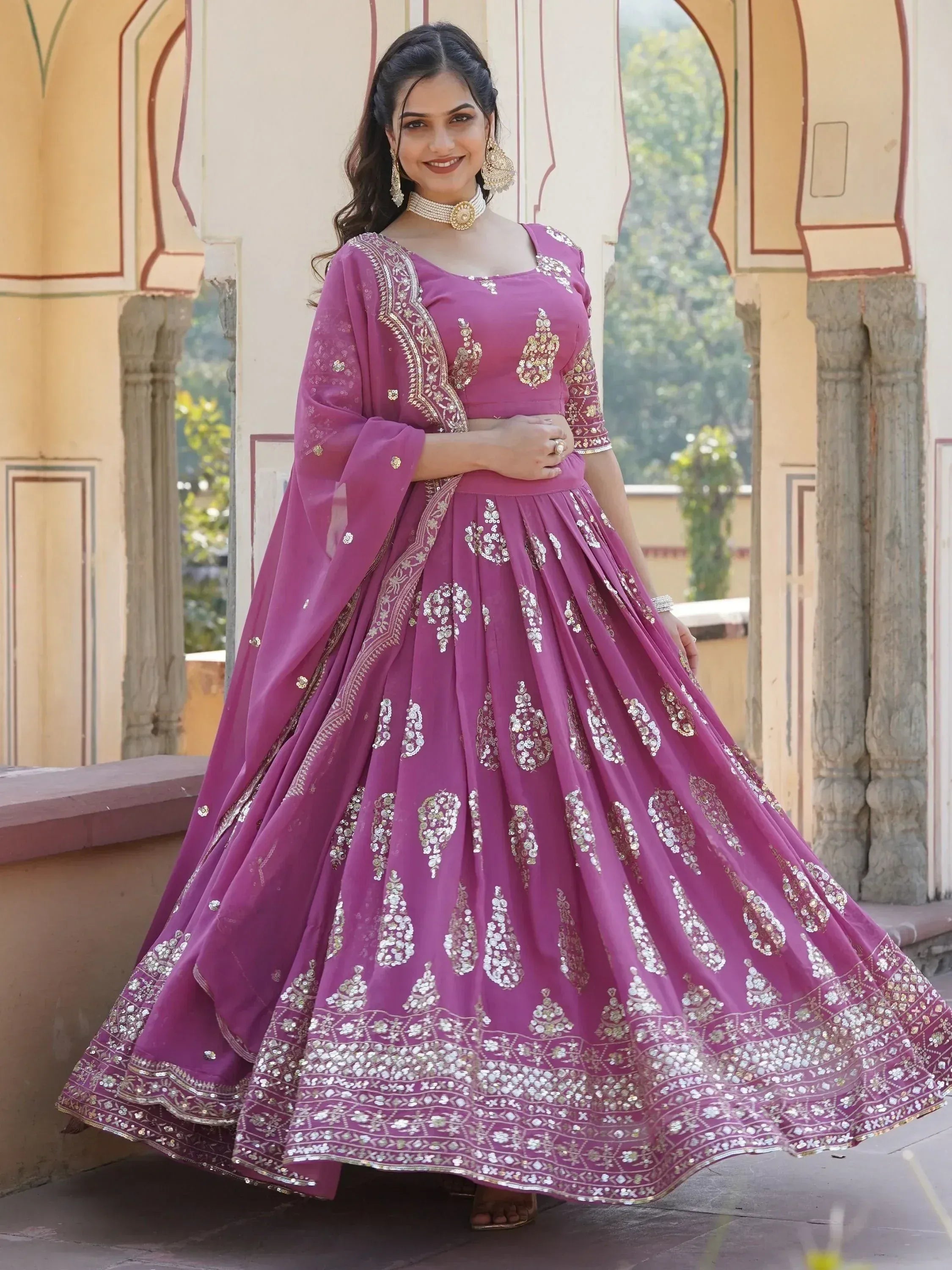 Purple designer lehenga choli with gold embroidery, perfect for Indian ethnic wear occasions