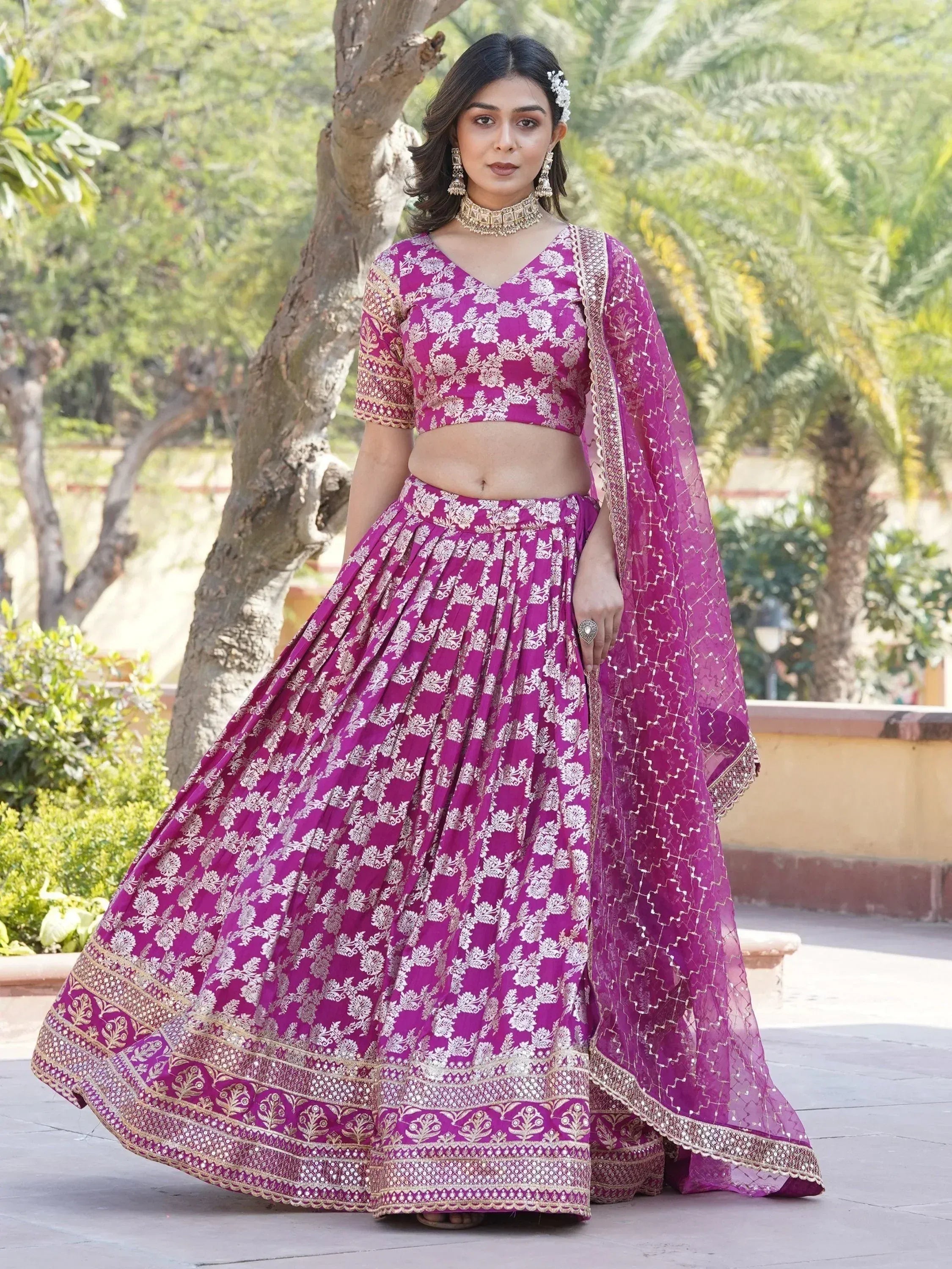 Purple floral lehenga choli with gold embroidery and matching dupatta, perfect for Indian ethnic occasions