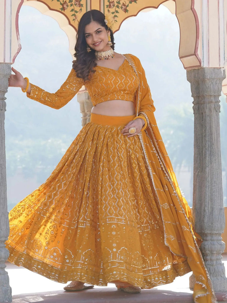 Captivating Yellow Sequins Georgette Haldi Wear Lehenga Choli
