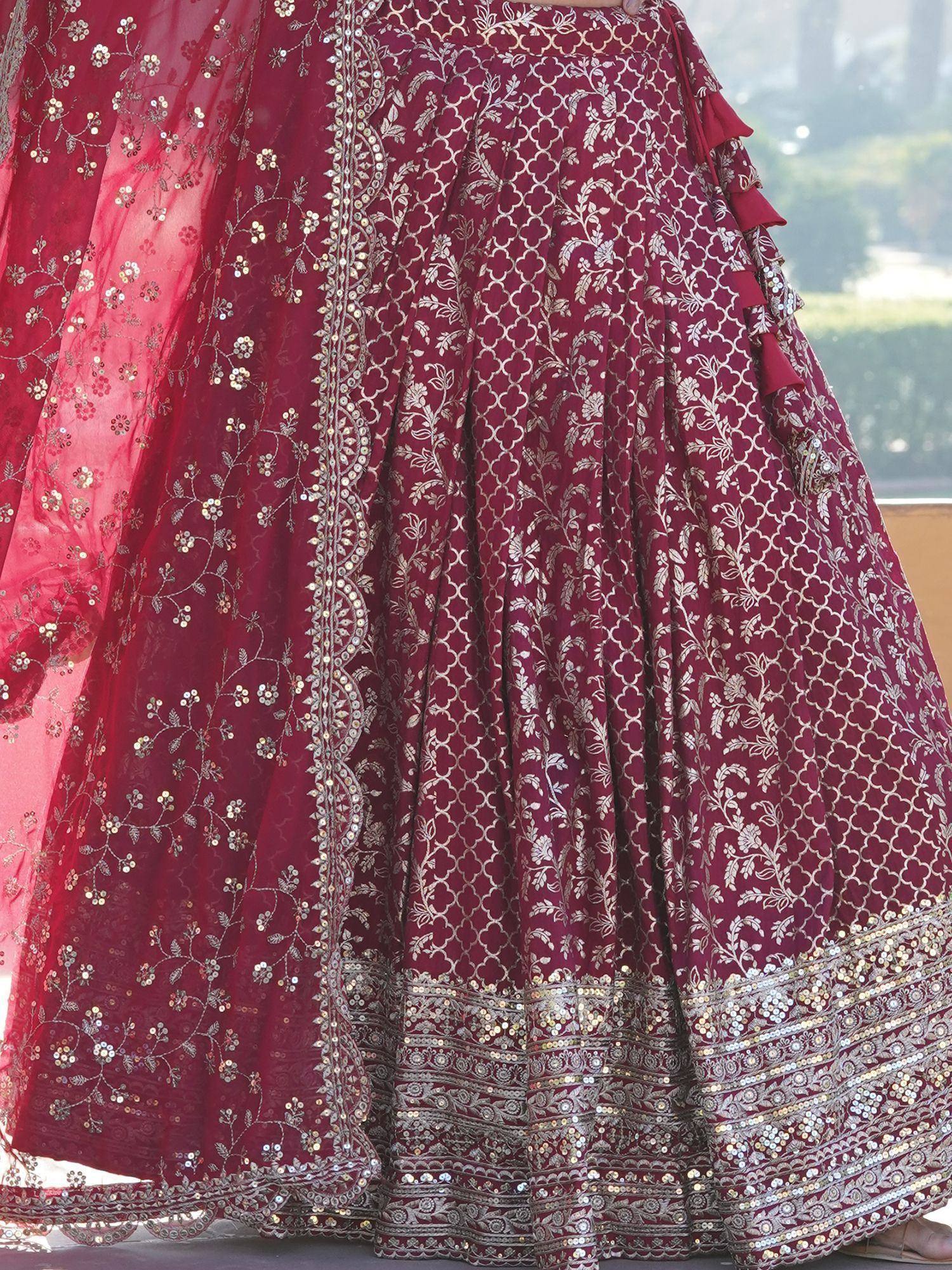 Maroon designer lehenga with gold floral embroidery and sequin detailing, perfect for Indian ethnic wear