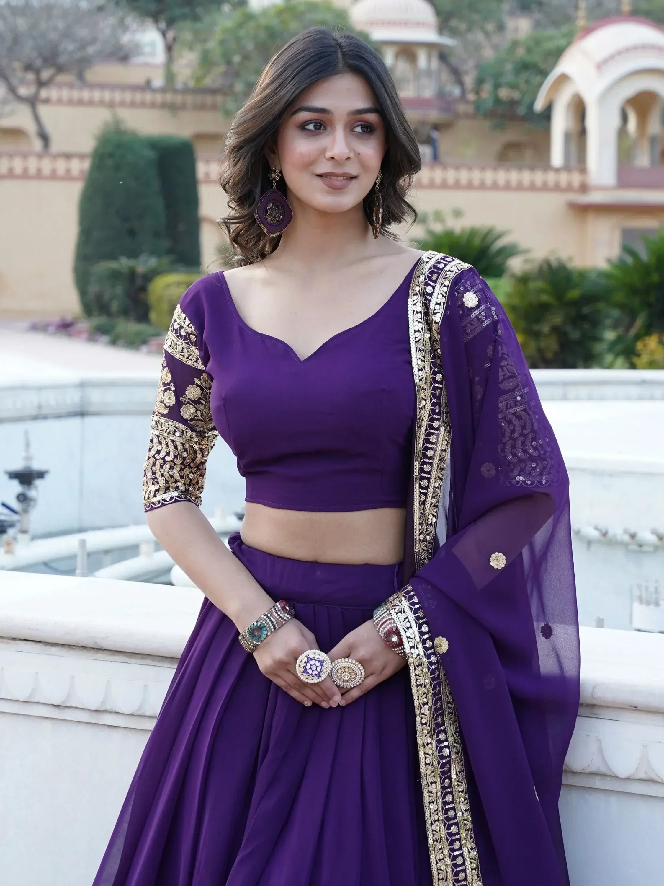 Purple designer lehenga choli with gold embroidery, perfect for Indian ethnic wear occasions