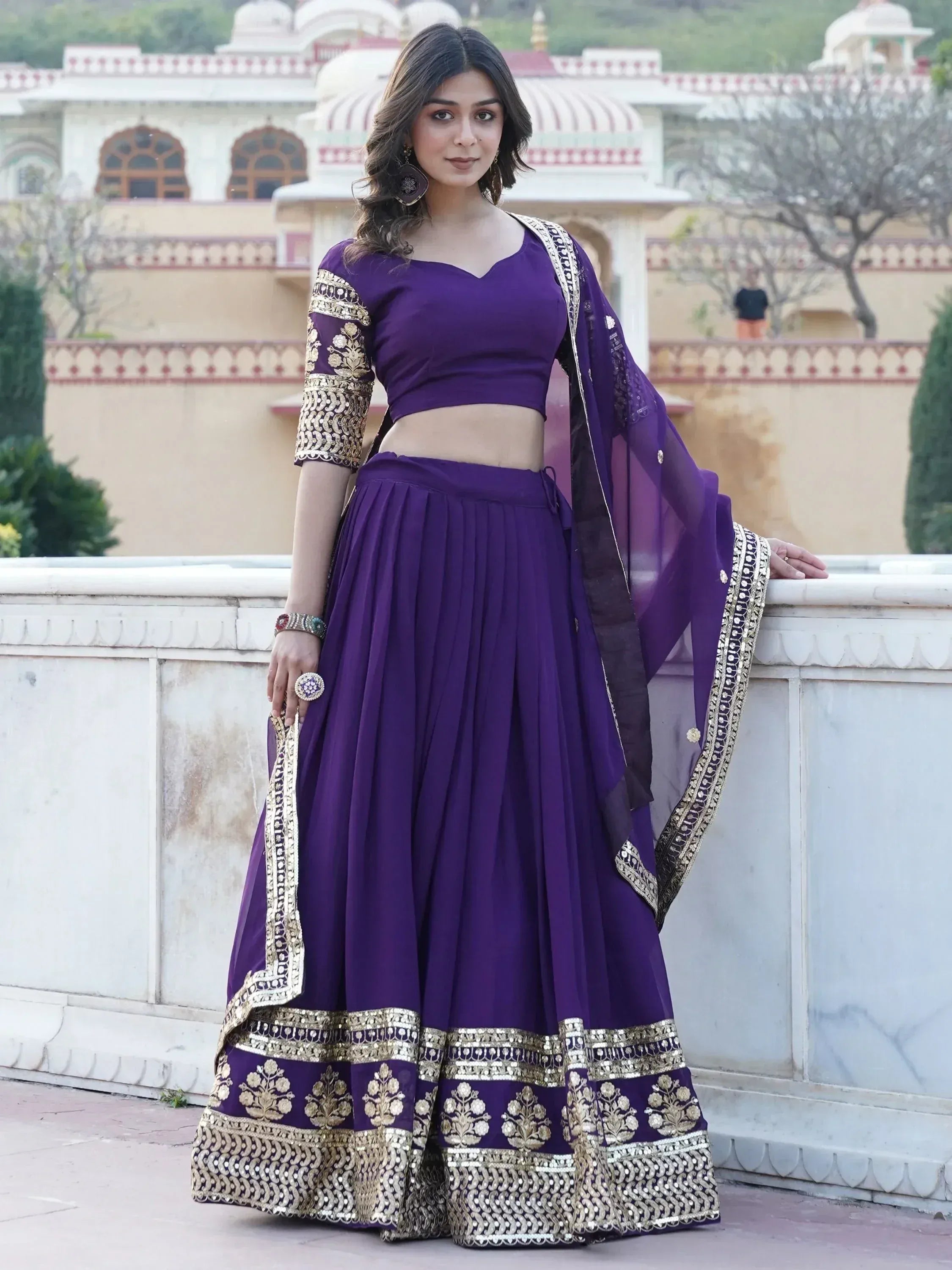 Purple designer lehenga choli with gold embroidery, perfect for Indian ethnic wear occasions