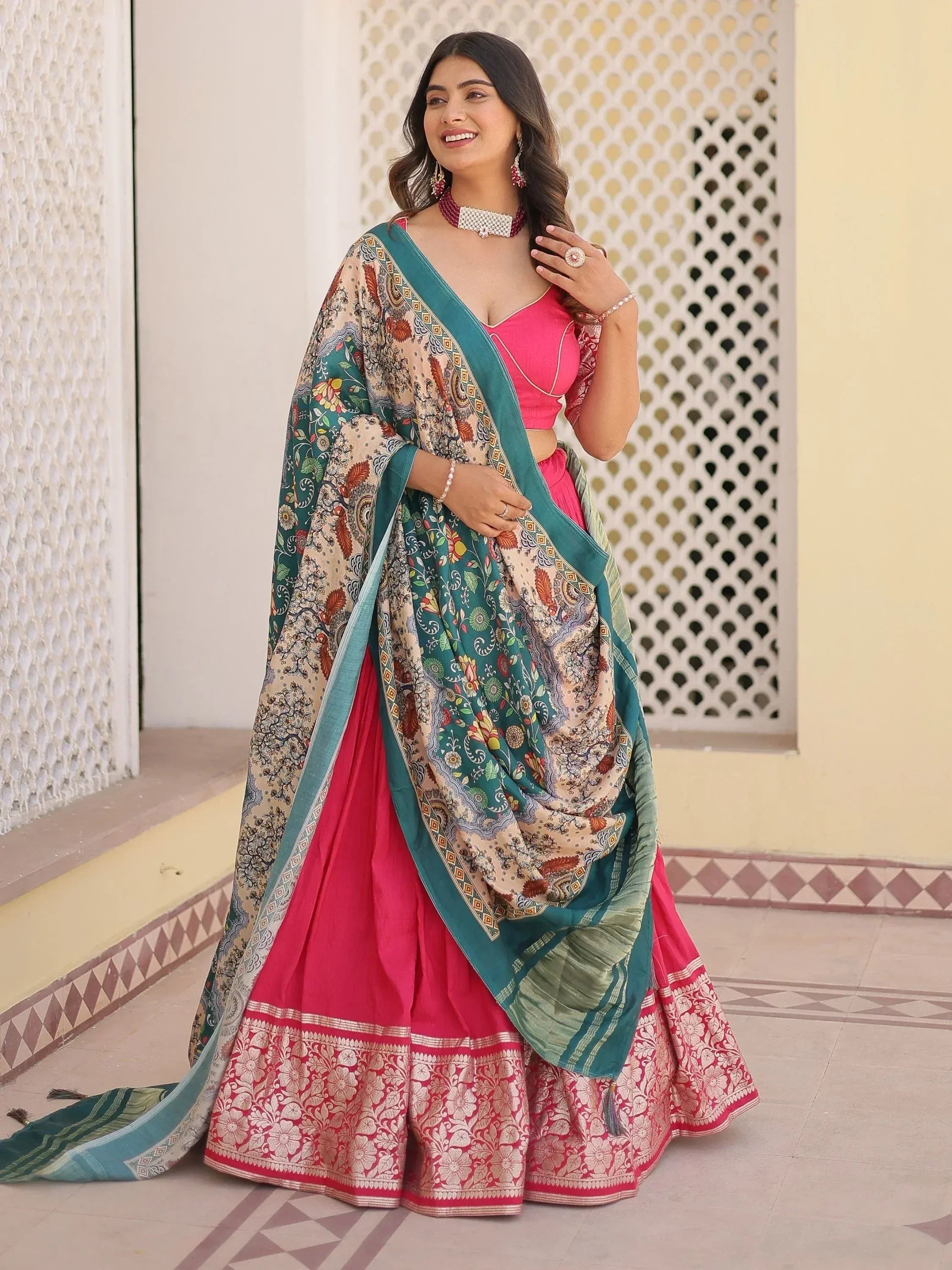 Pink lehenga choli with floral dupatta, ethnic Indian wear for festive occasions