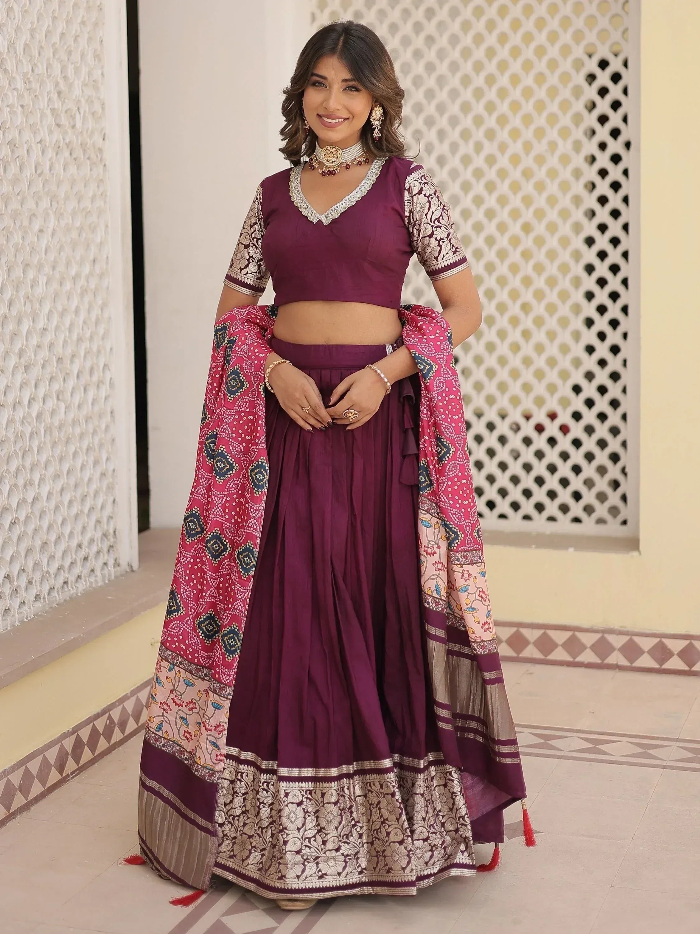 Elegant purple lehenga choli with floral dupatta, perfect for Indian ethnic wear occasions.