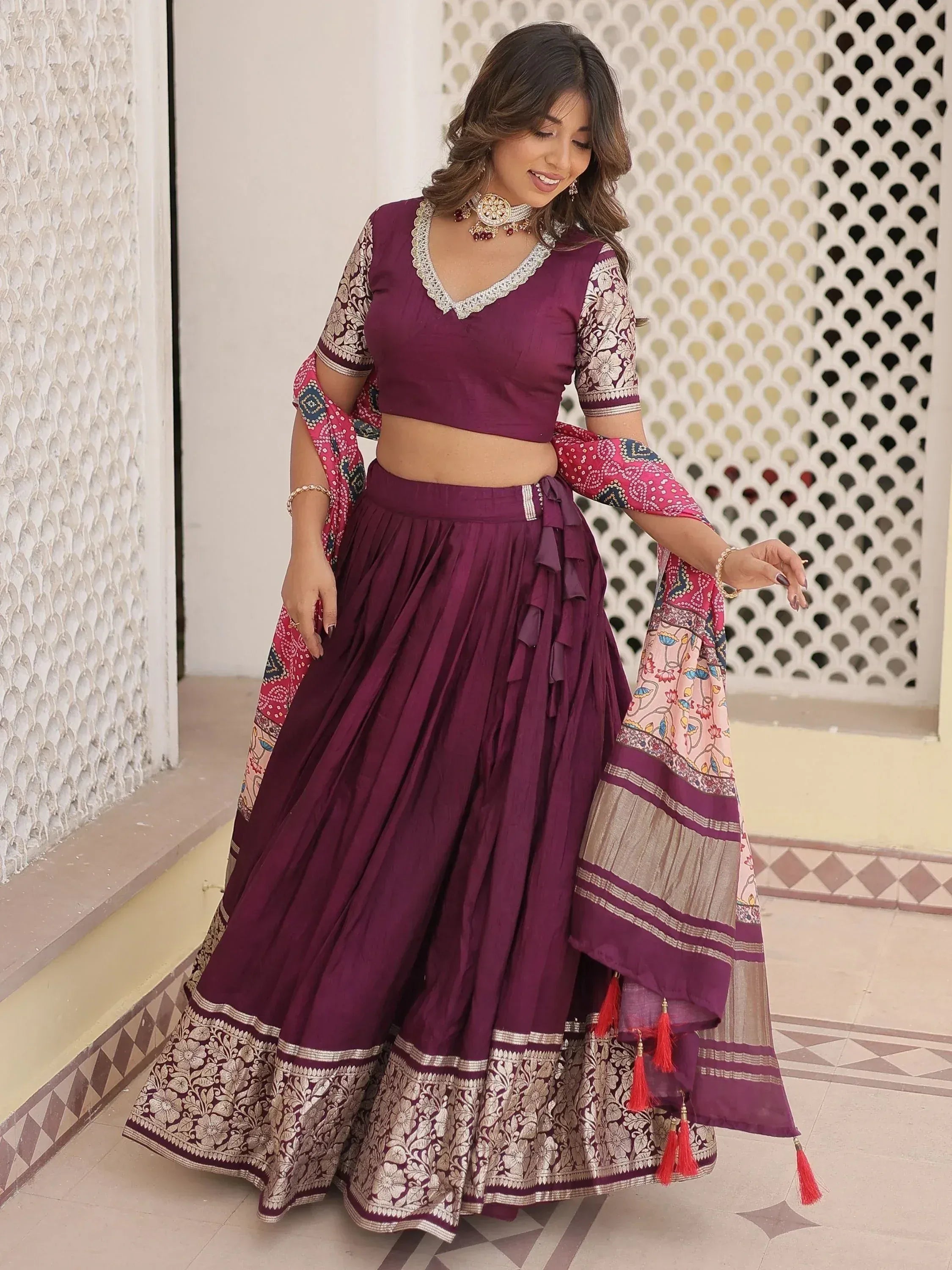 Elegant purple lehenga choli with floral embroidery and matching dupatta for Indian ethnic wear