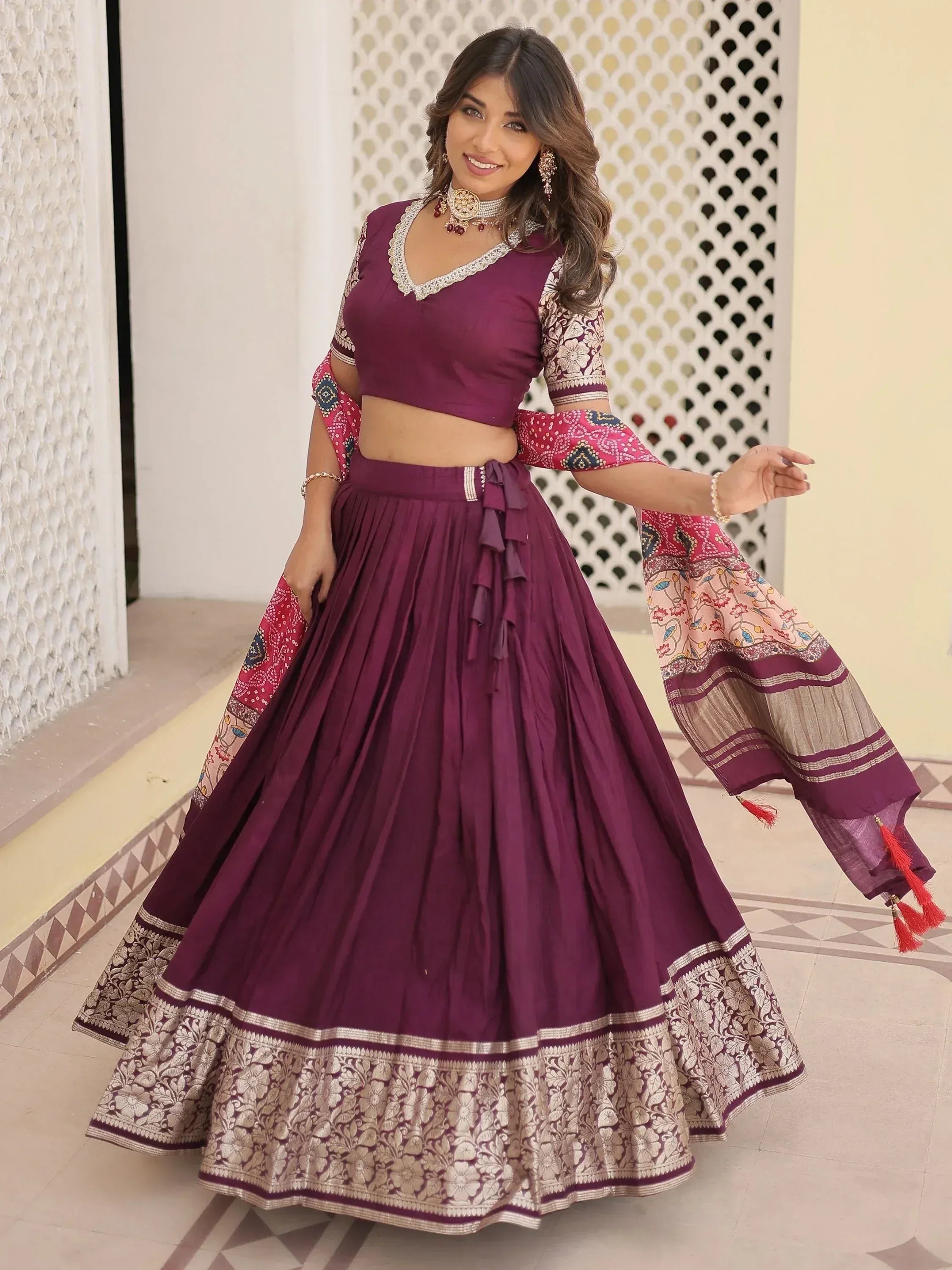 Elegant purple lehenga choli with floral border and dupatta for Indian ethnic wear