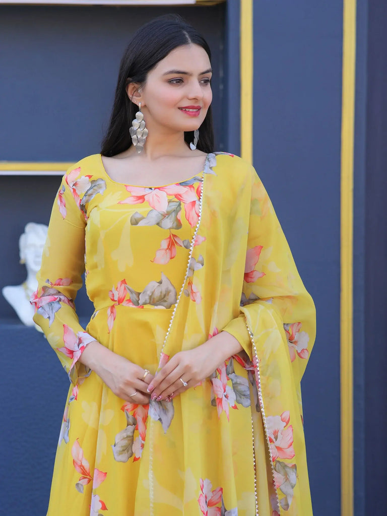 Awesome Yellow Floral Printed Silk Haldi Wear Gown With Dupatta