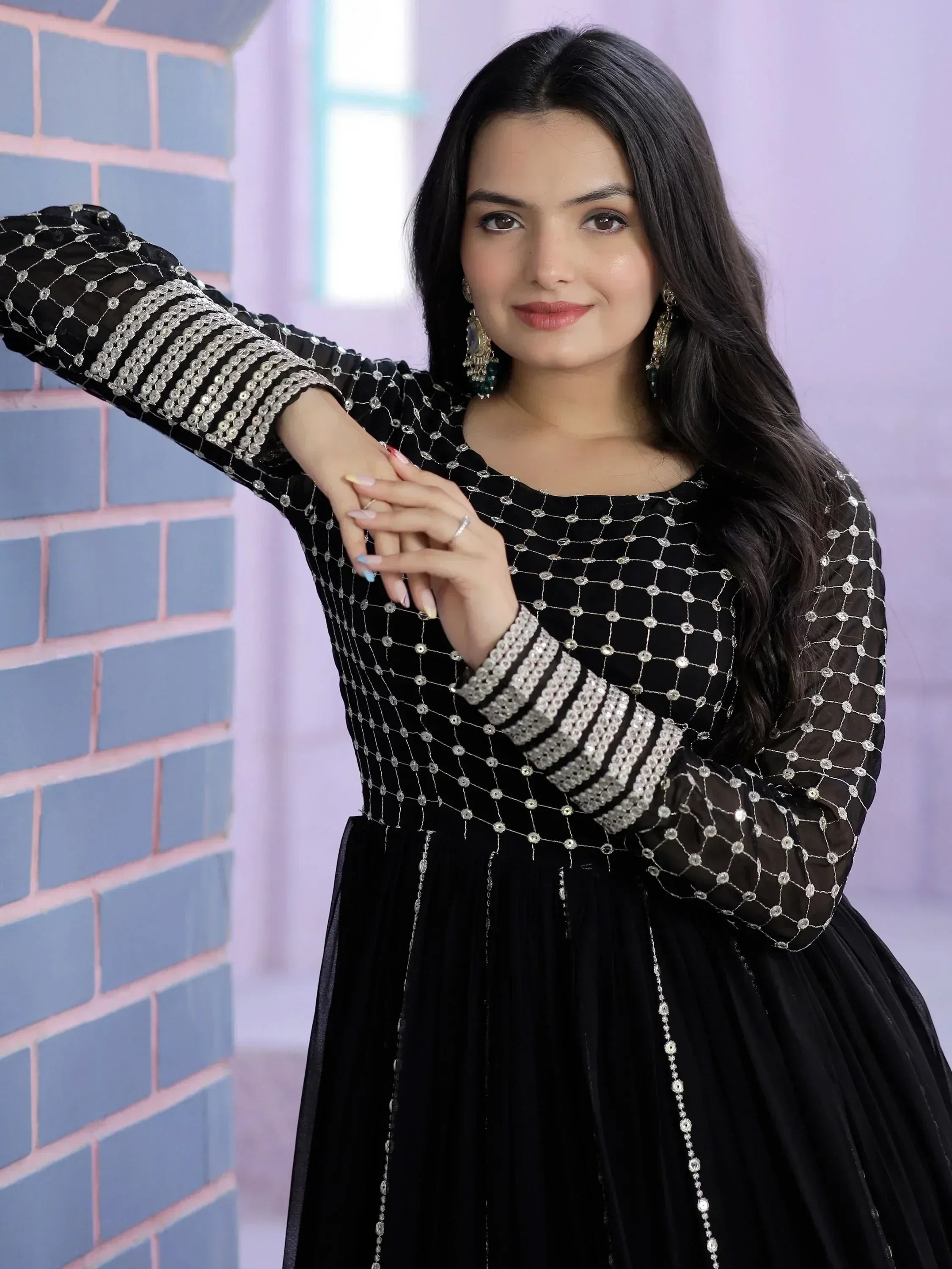 Black ethnic gown with silver embroidery, perfect for Indian occasions and festive wear.