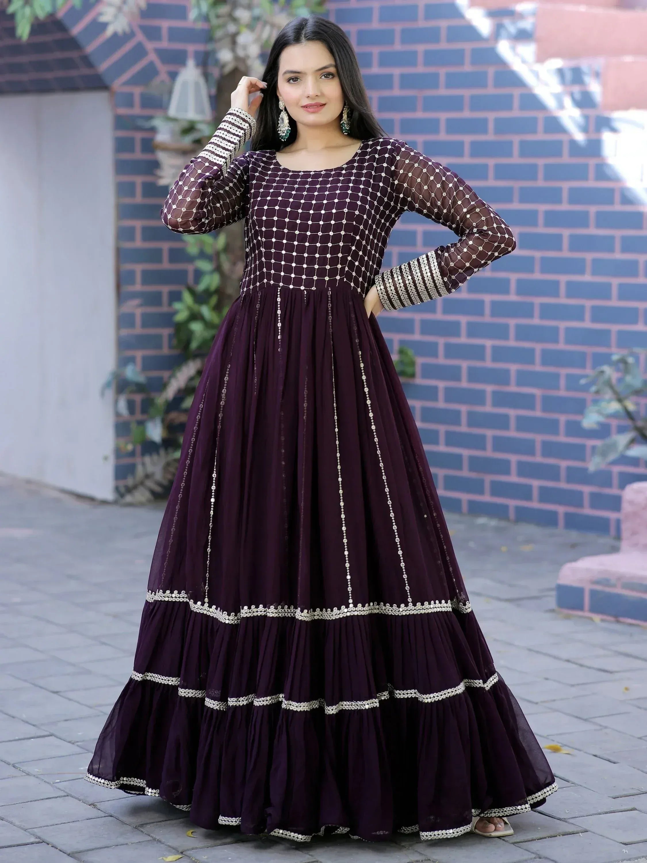 Elegant purple ethnic gown with silver embroidery, perfect for Indian festive occasions and weddings.
