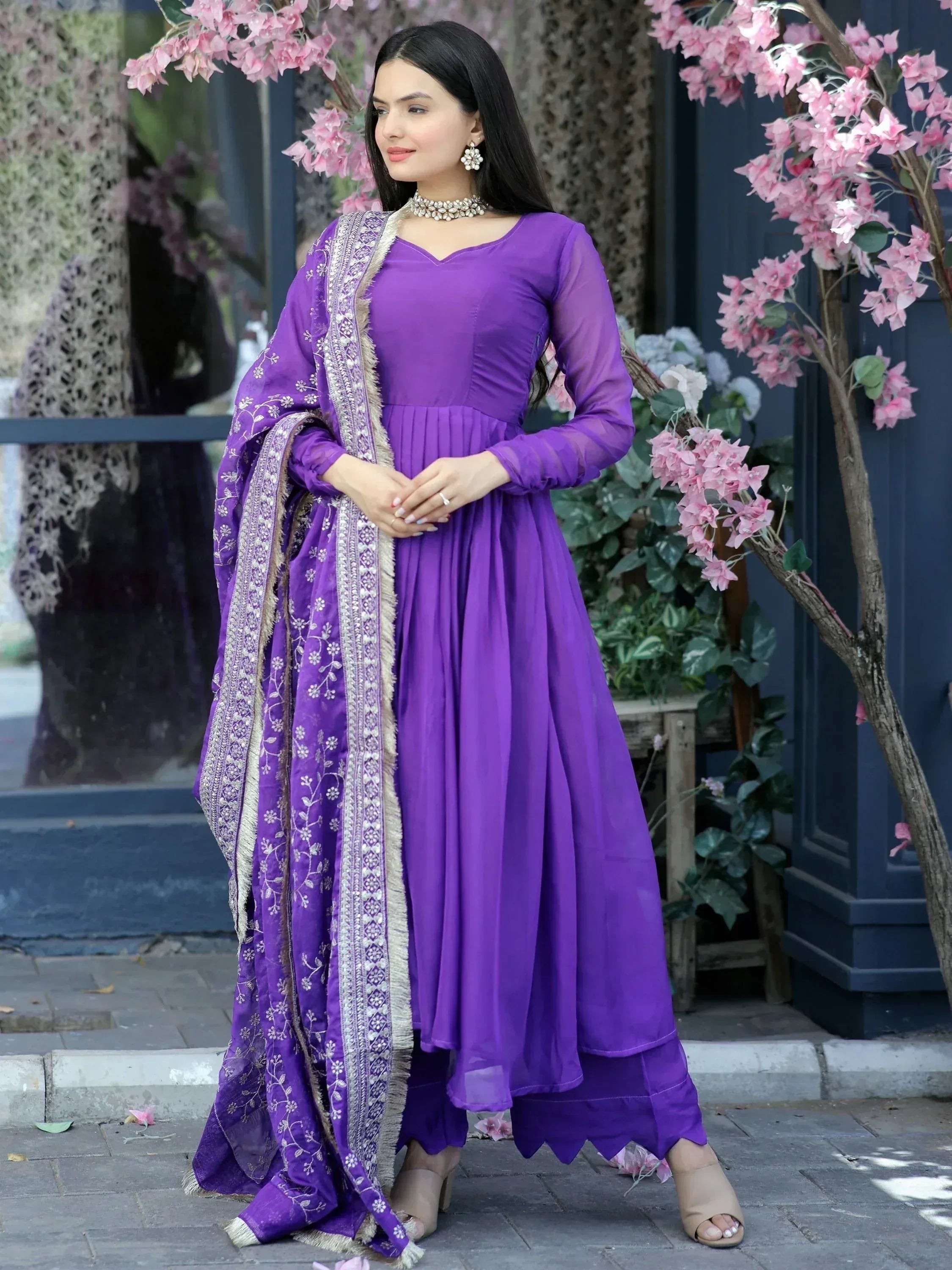 Purple ethnic anarkali suit with embroidered dupatta, perfect for Indian occasions and festive wear.