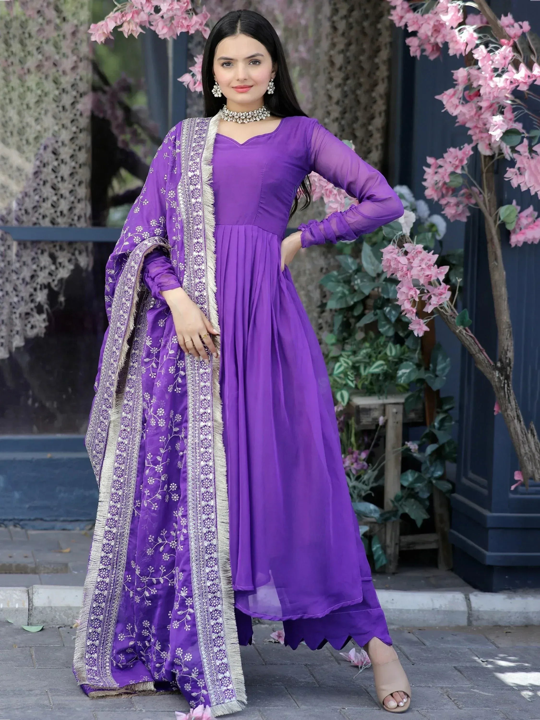 Purple ethnic anarkali suit with embroidered dupatta, perfect for Indian occasions and festive wear.