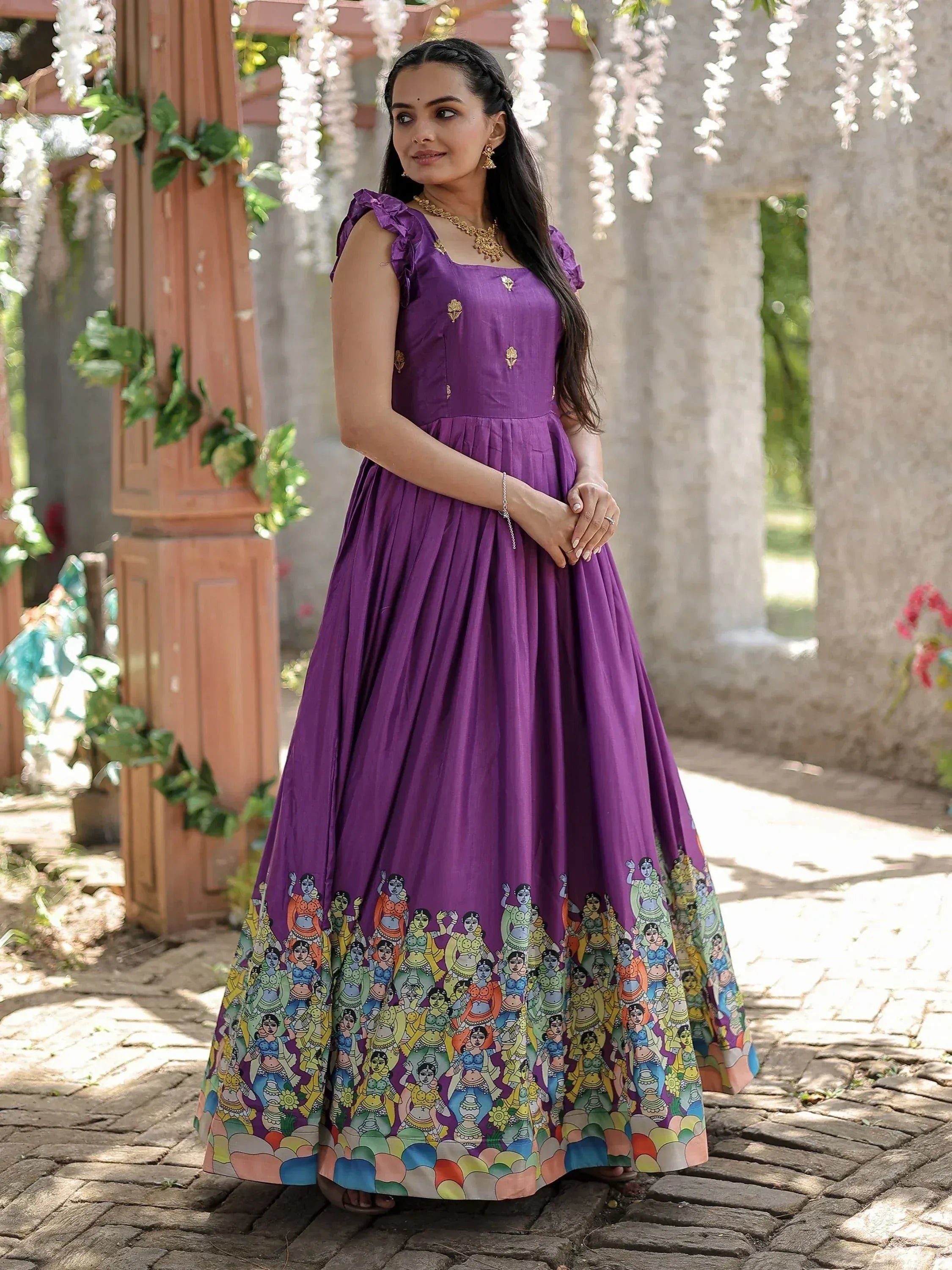 Purple ethnic gown with colorful folk art print, ruffled sleeves, and gold embroidery for women