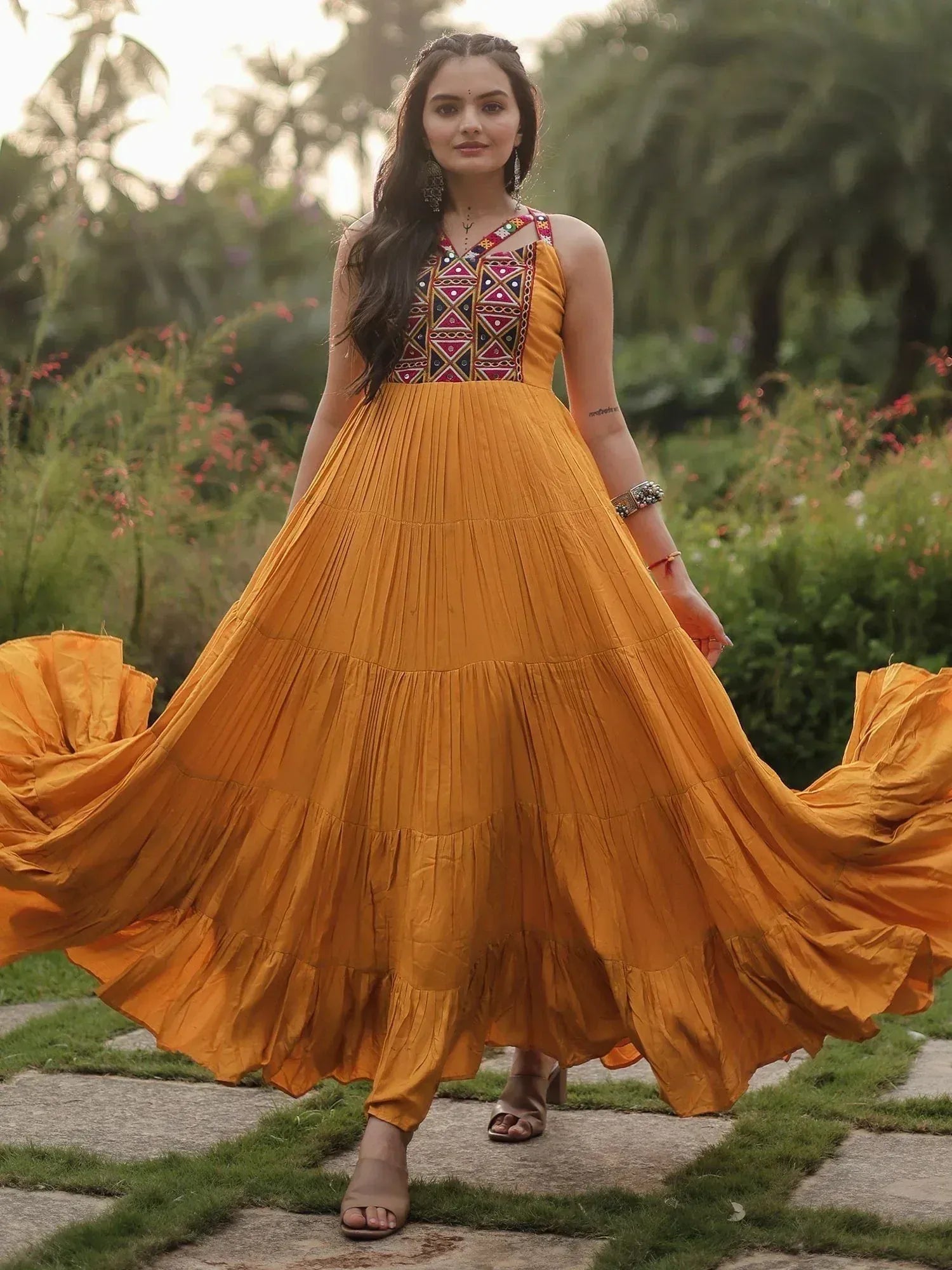 Mustard yellow ethnic gown with embroidered bodice, pleated skirt, perfect for Indian festive occasions