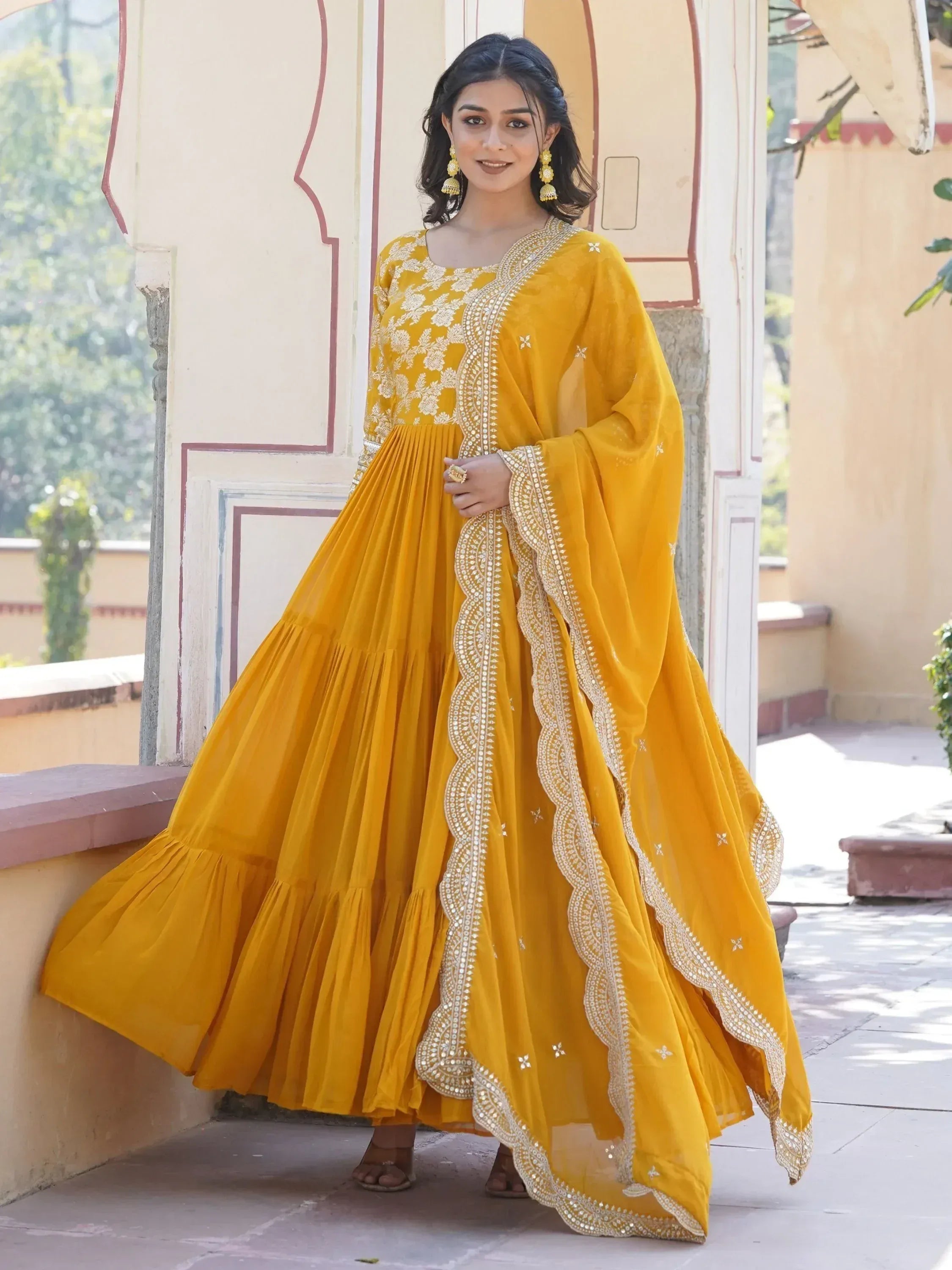 Yellow embroidered anarkali suit with flared skirt, perfect for Indian ethnic occasions