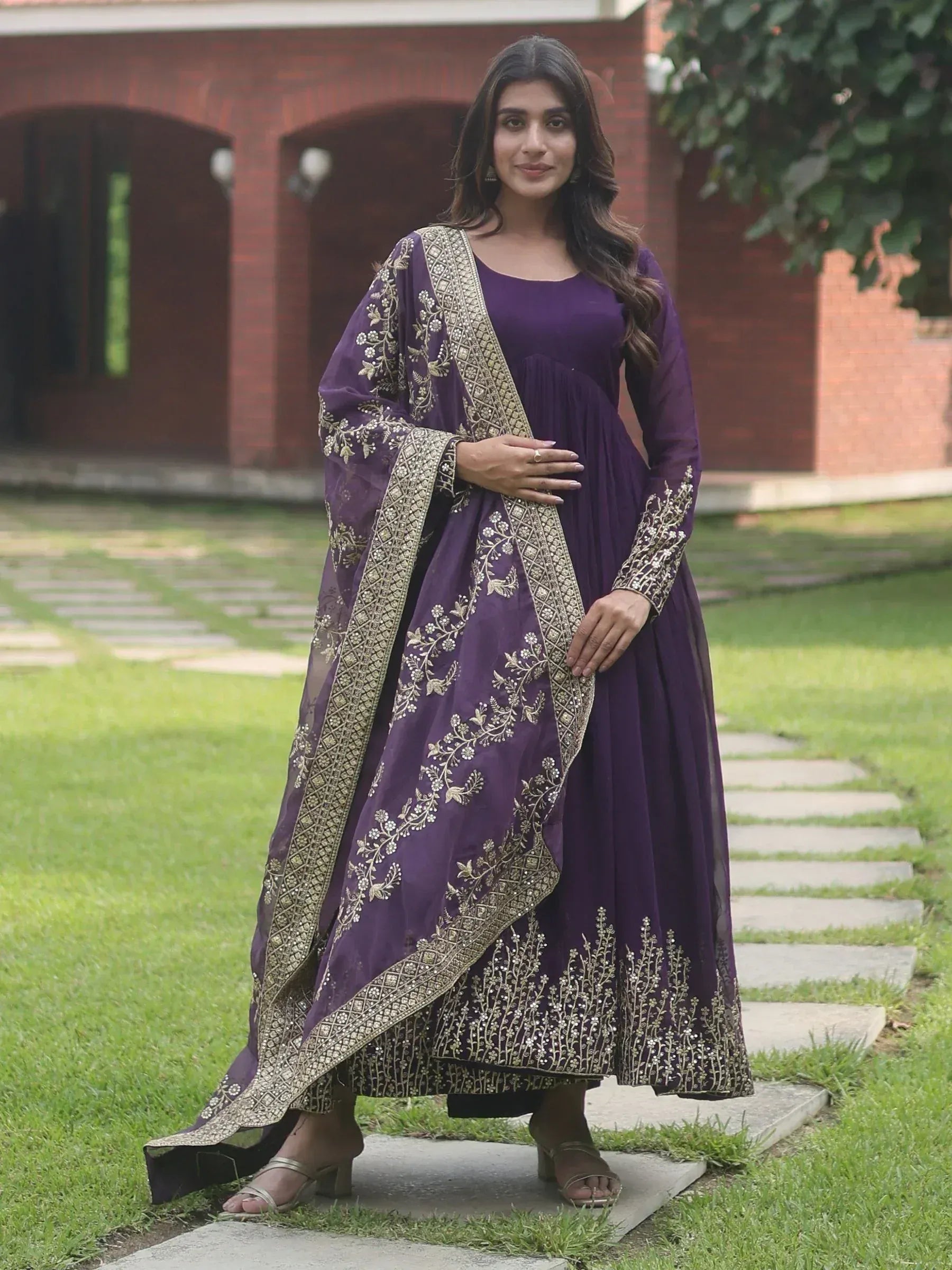 Purple embroidered anarkali suit with gold floral detailing, perfect for Indian ethnic occasions