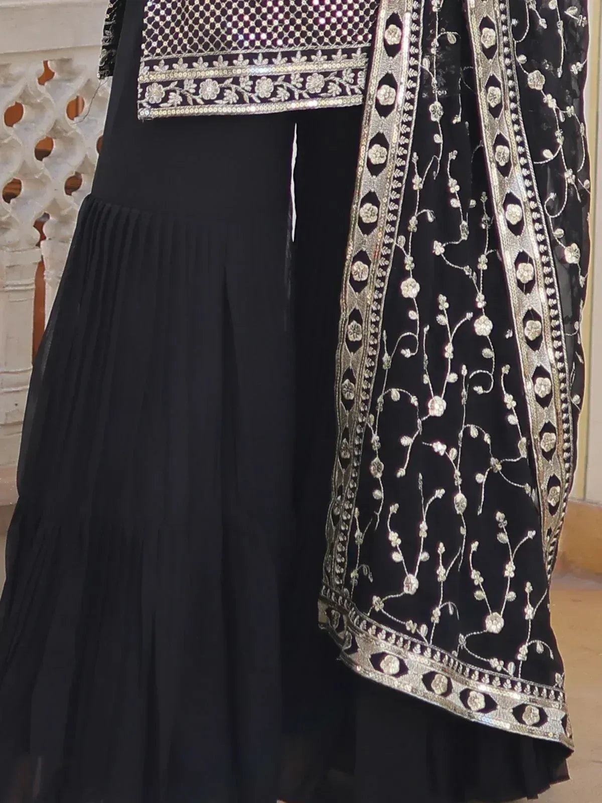Black ethnic gown with silver floral embroidery and pleated skirt