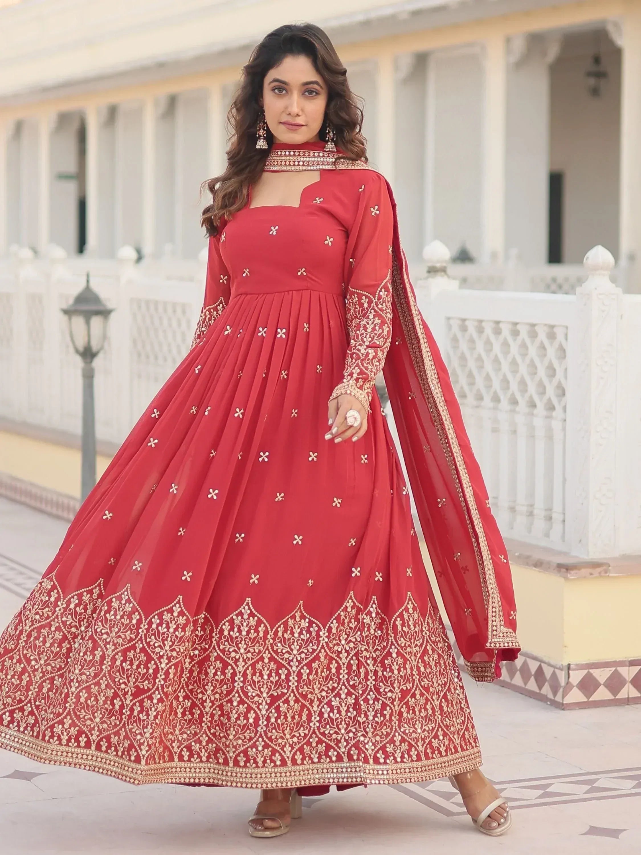 Red embroidered anarkali gown with gold detailing, perfect for Indian ethnic wear occasions