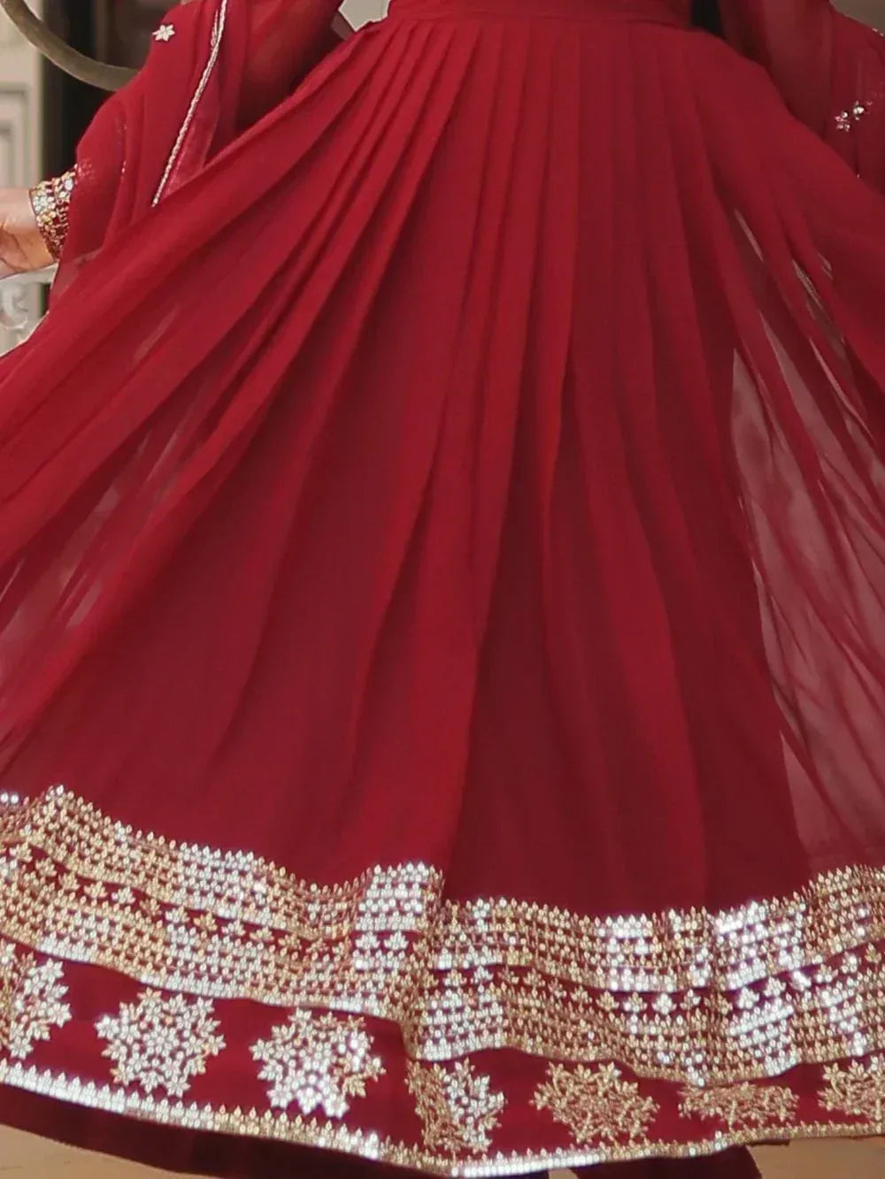 Red designer lehenga with gold and silver embroidery, perfect for Indian ethnic wear occasions