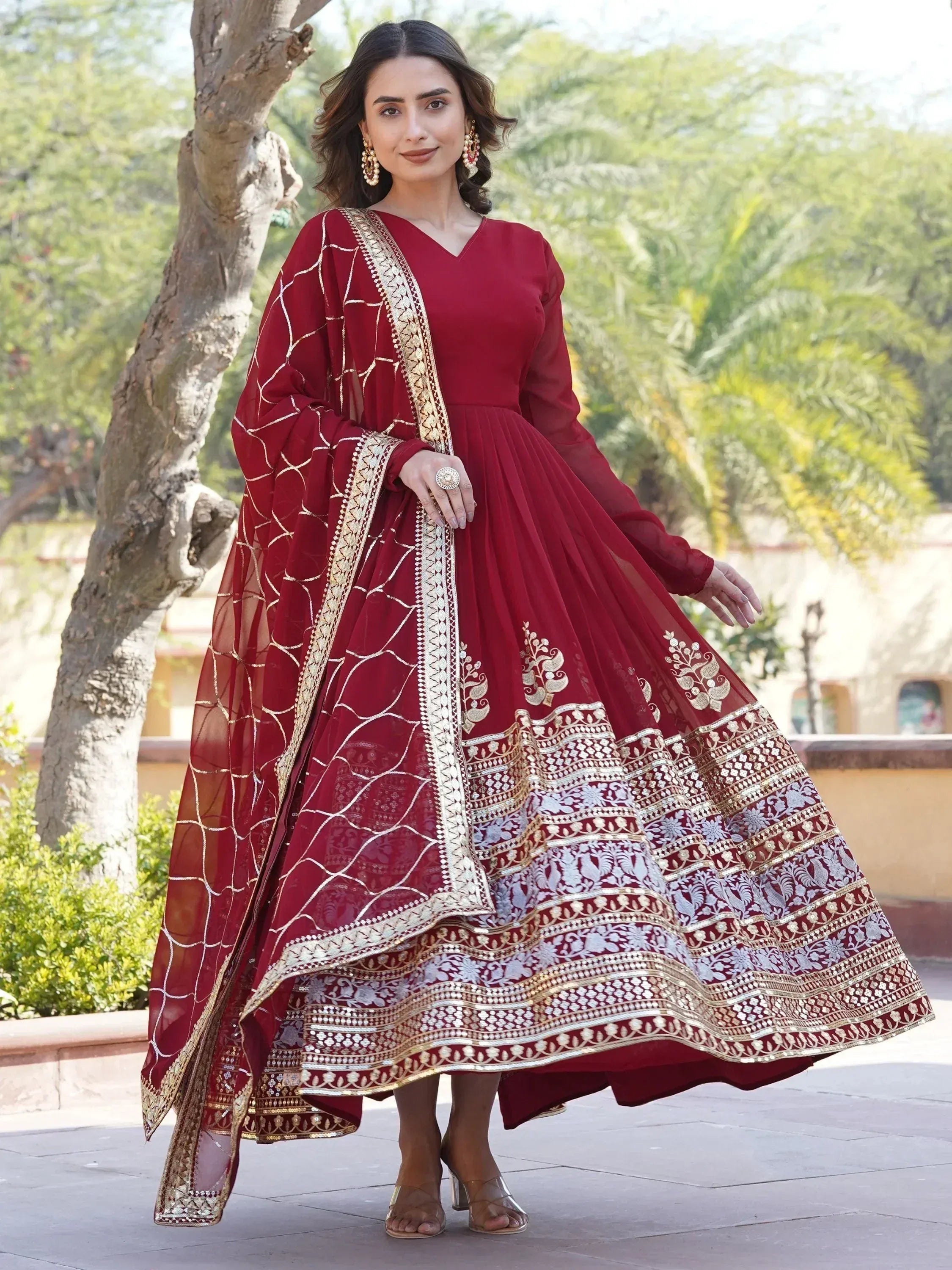 Maroon designer anarkali with gold embroidery, perfect for Indian ethnic wear occasions