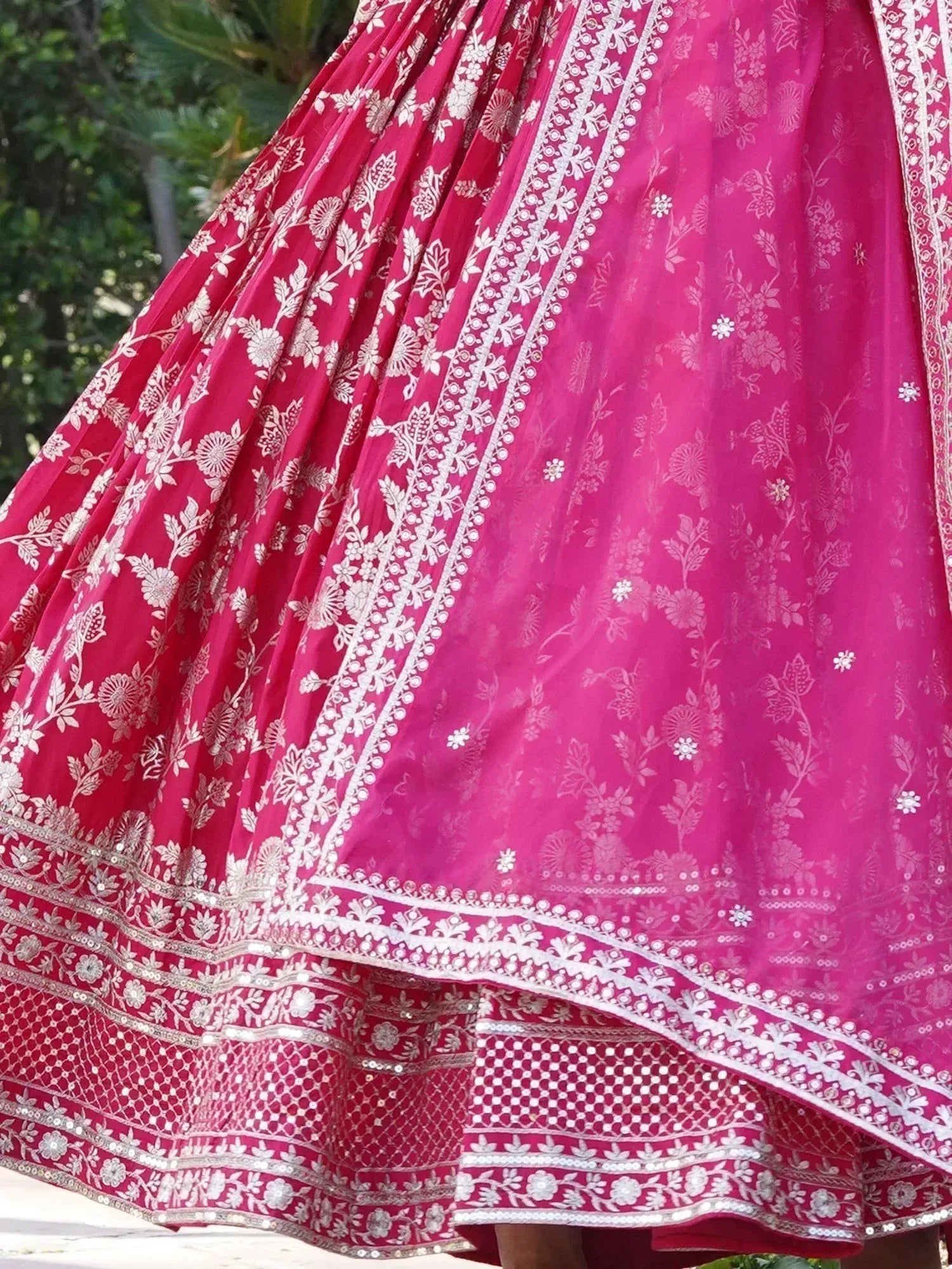 Pink designer lehenga with intricate white floral embroidery and detailed border, Indian ethnic wear
