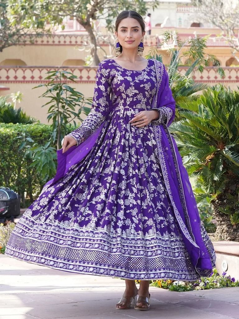 Fascinating Purple Embroidered Jacquard Traditional Gown With Dupatta