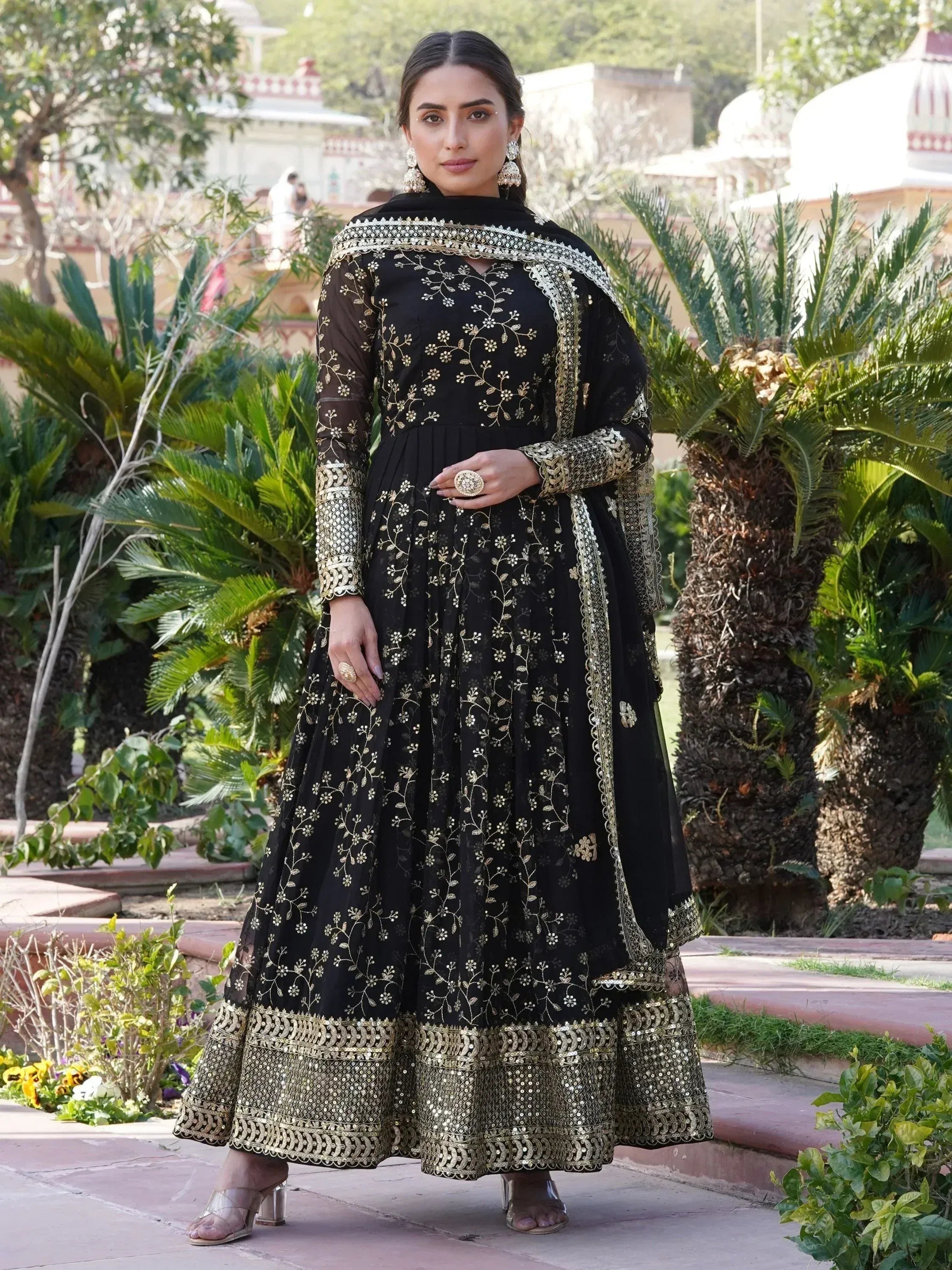 Black and gold embroidered anarkali suit with floral zari work, perfect for Indian ethnic occasions