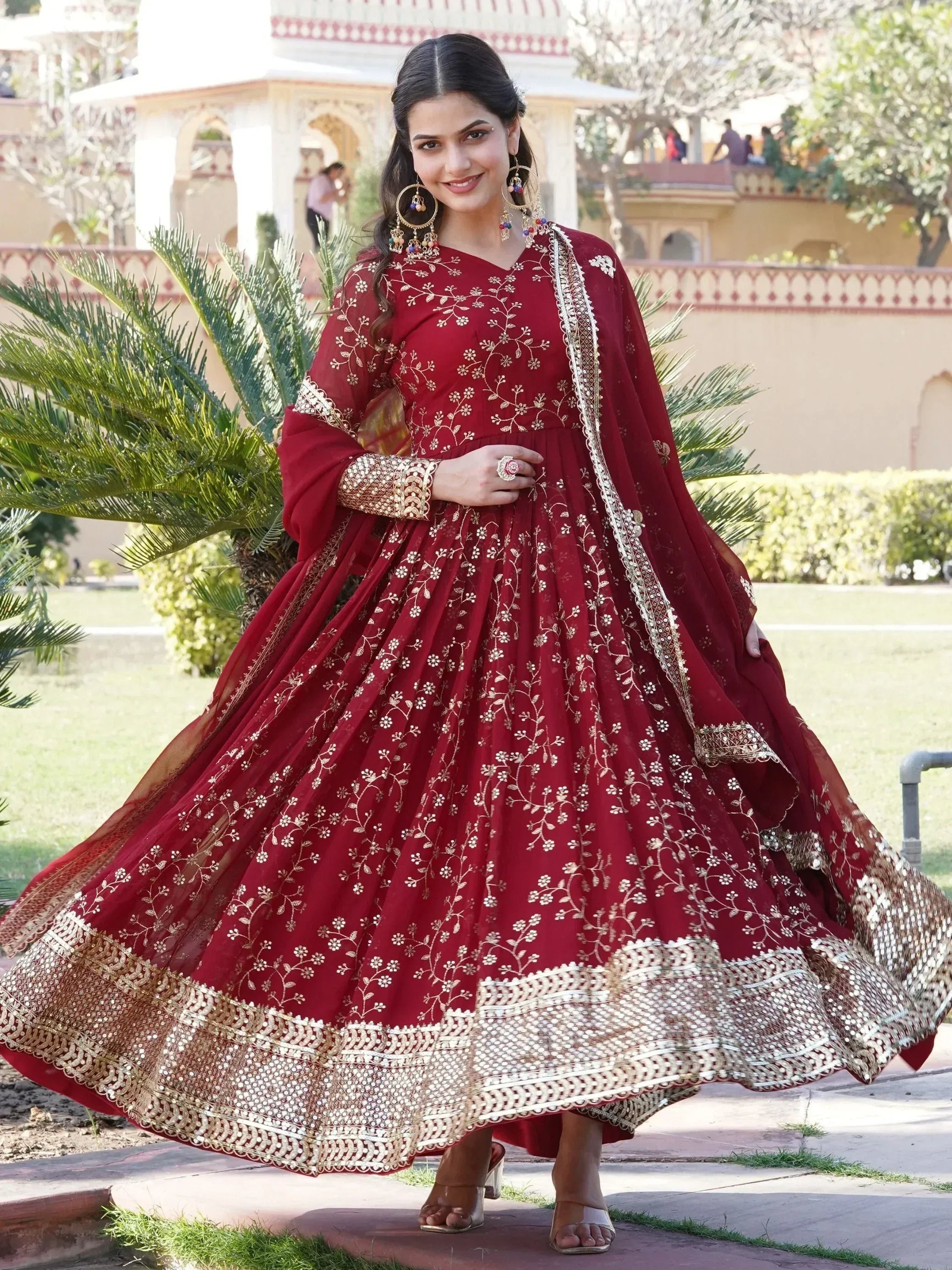 Maroon embroidered anarkali suit with gold floral work, perfect for Indian ethnic occasions