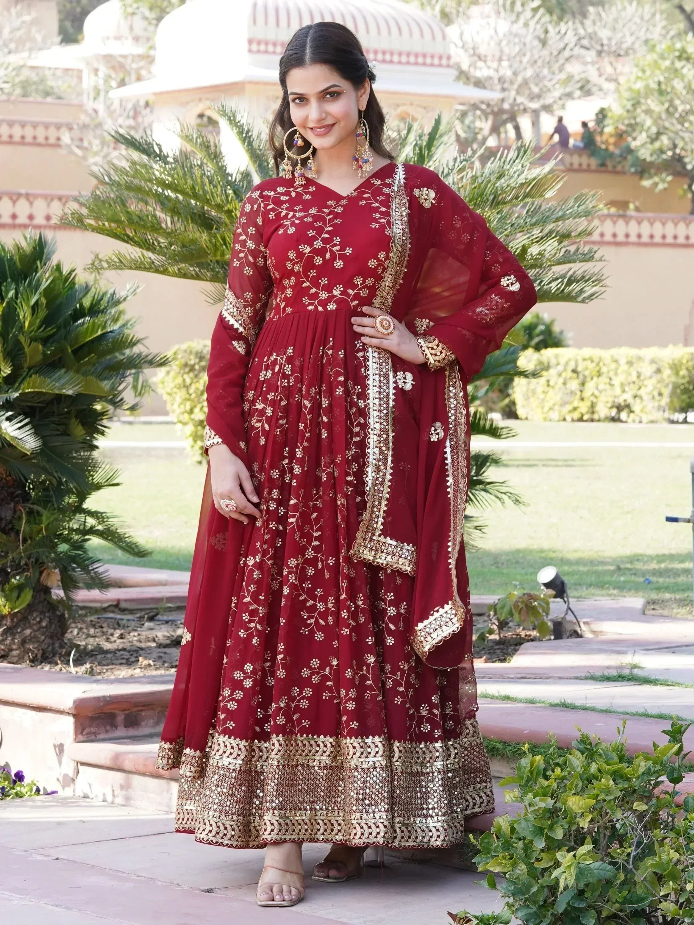 Maroon embroidered anarkali suit with gold detailing, perfect for Indian ethnic wear occasions