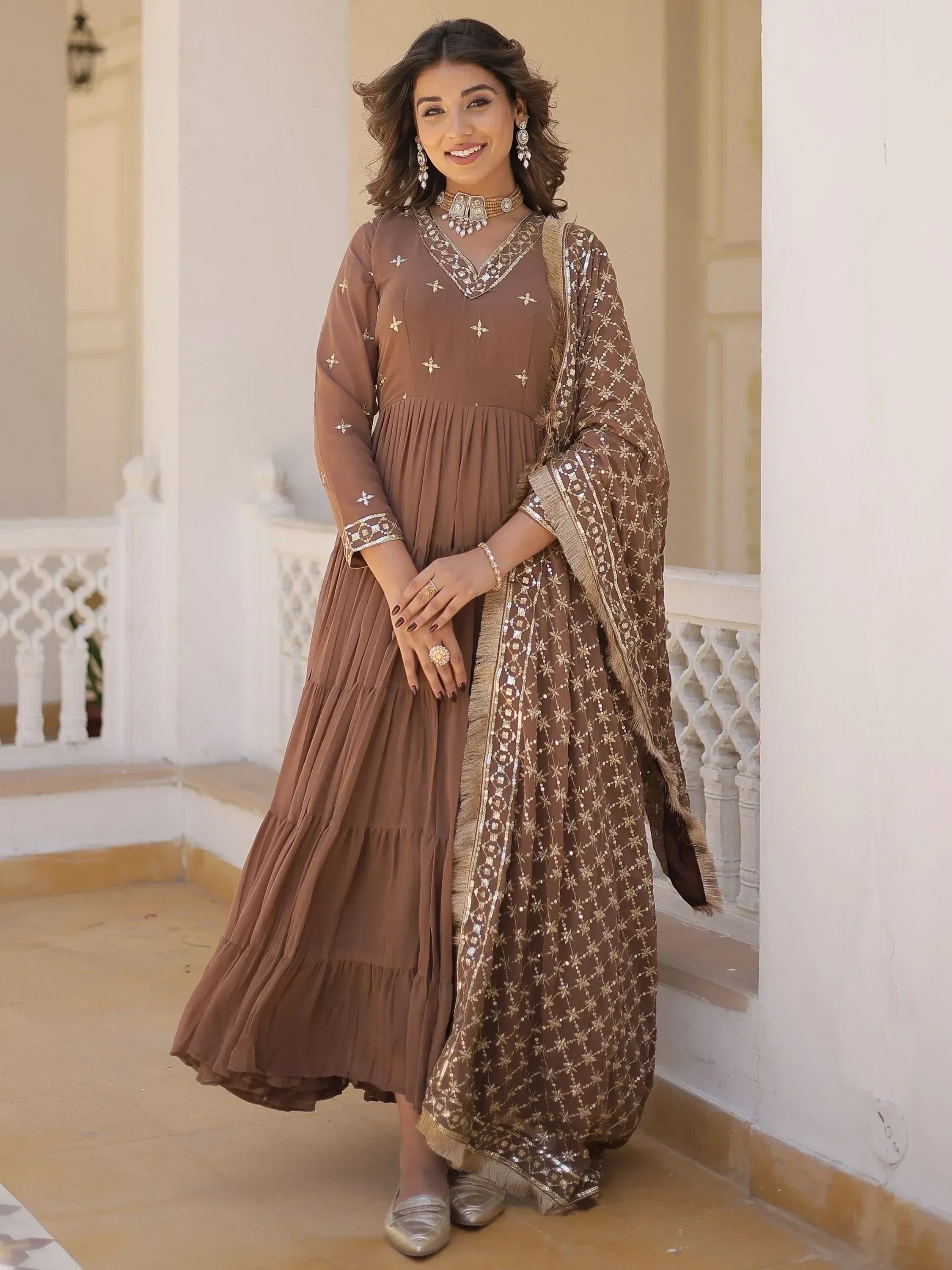 Brown embroidered ethnic gown with sequin dupatta, perfect for Indian festive occasions