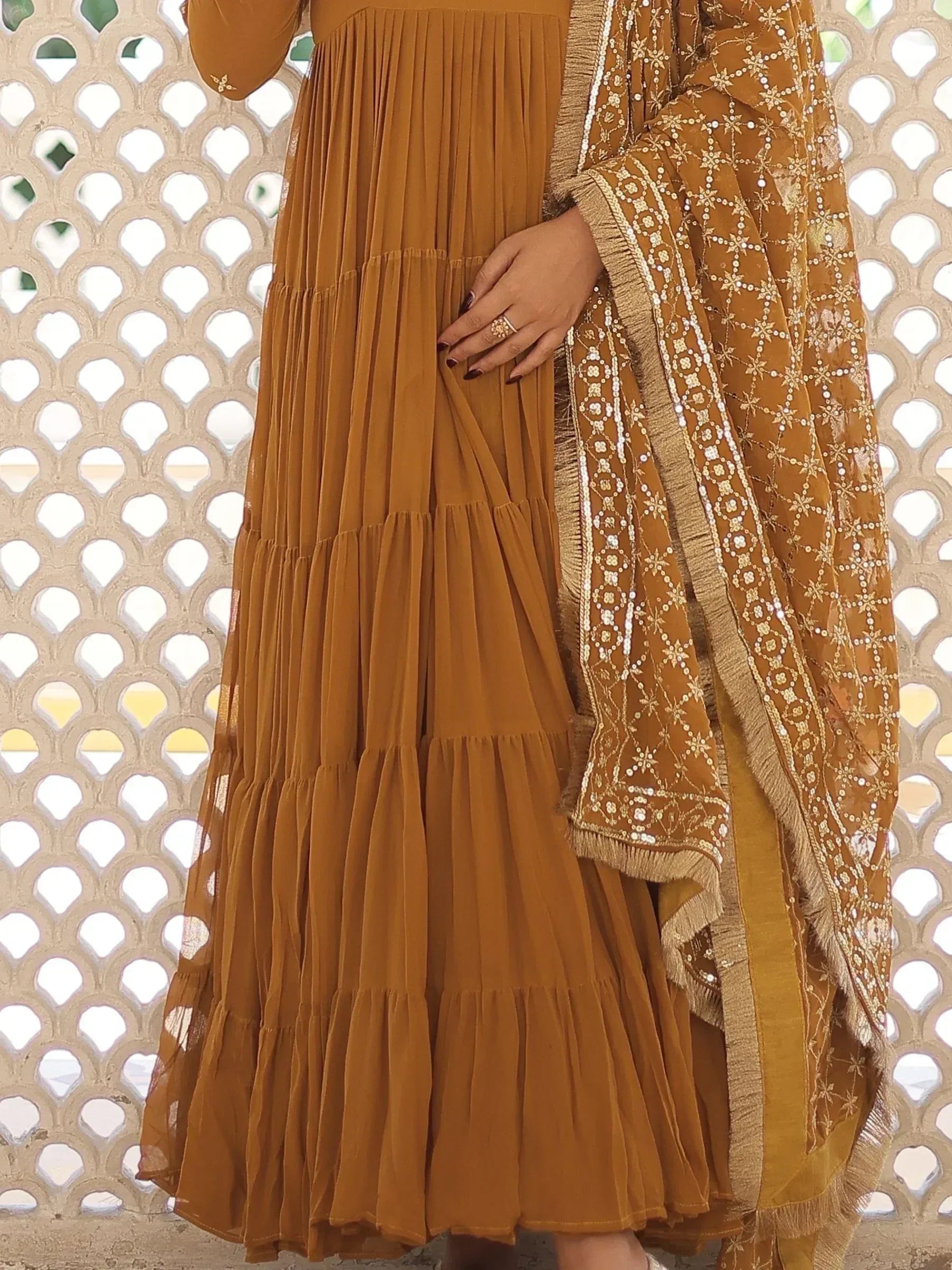 Mustard pleated ethnic gown with embroidered dupatta, perfect for Indian occasions